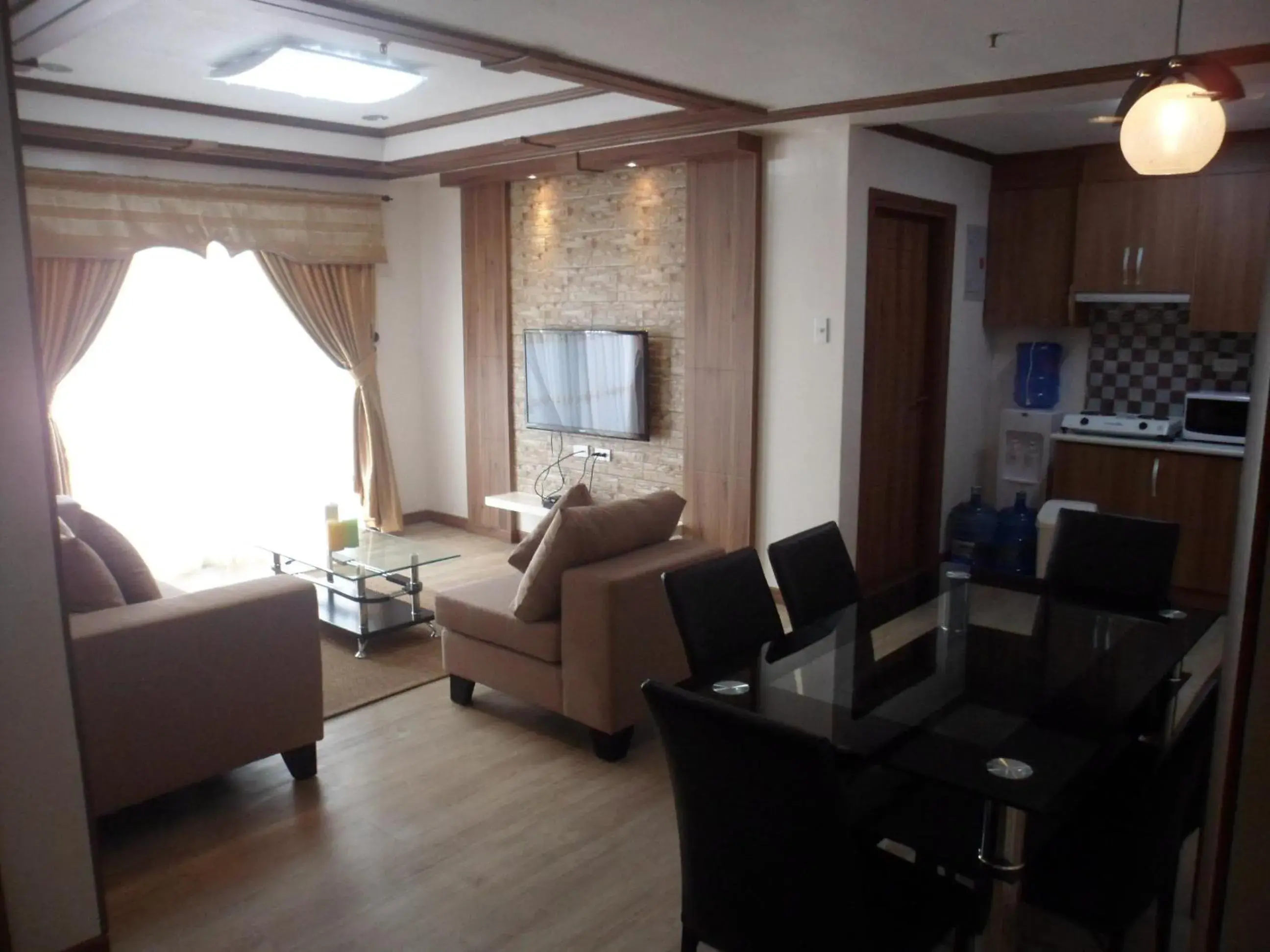 TV and multimedia, Seating Area in Prestige Vacation Apartments - Bonbel Condominium