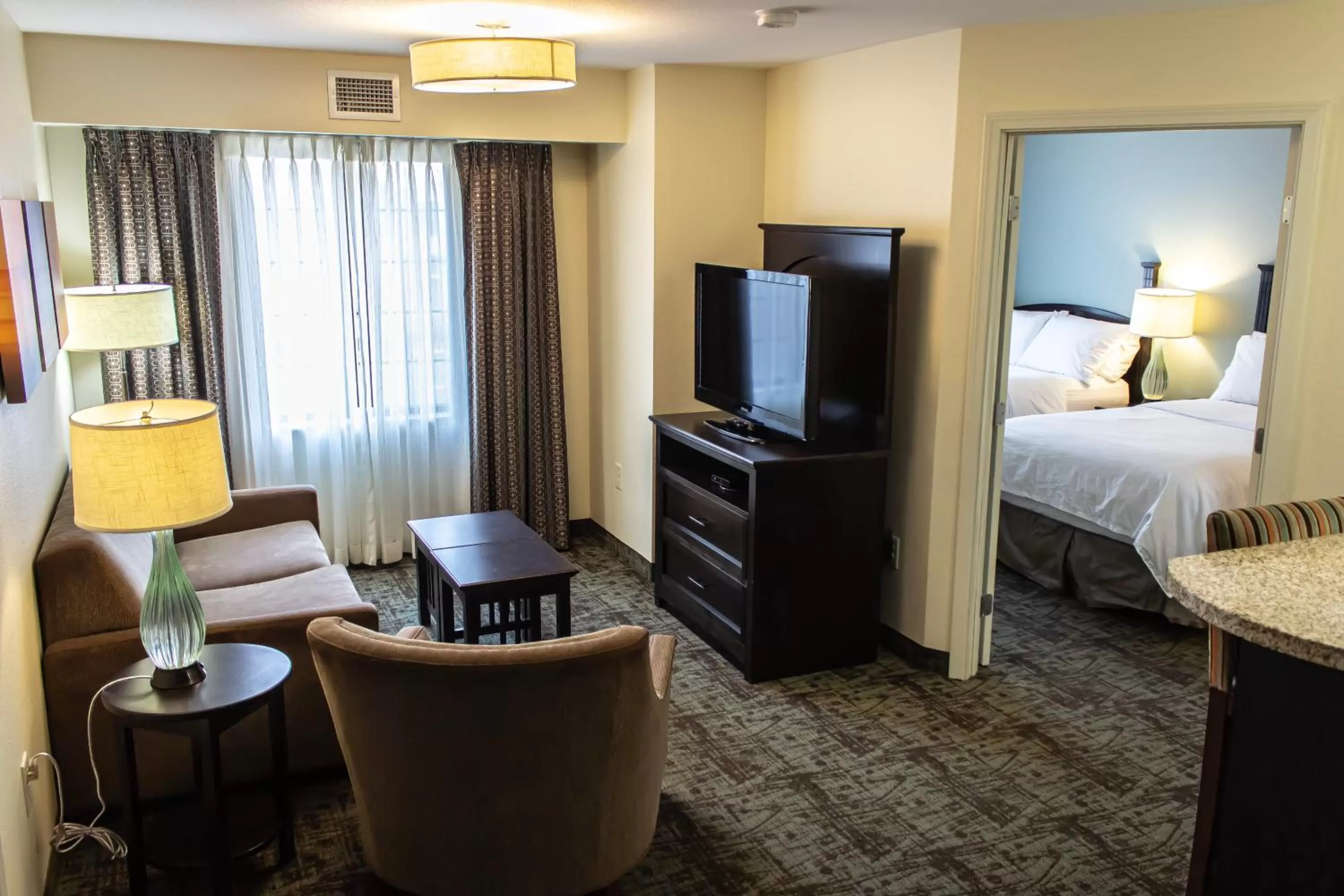 Photo of the whole room, Bed in Staybridge Suites Minot by IHG