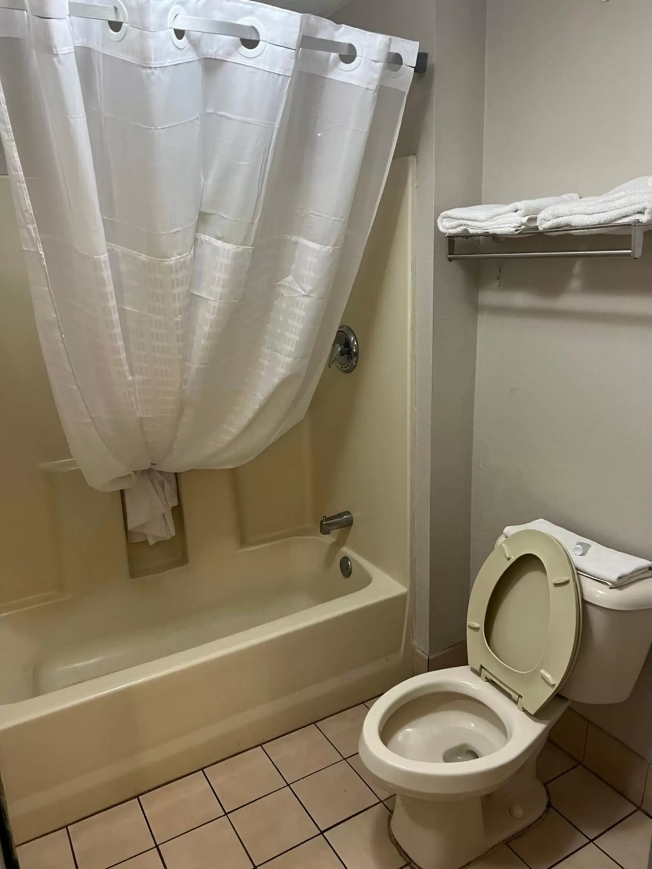 Bathroom in Days Inn by Wyndham North Columbia Ft. Jackson