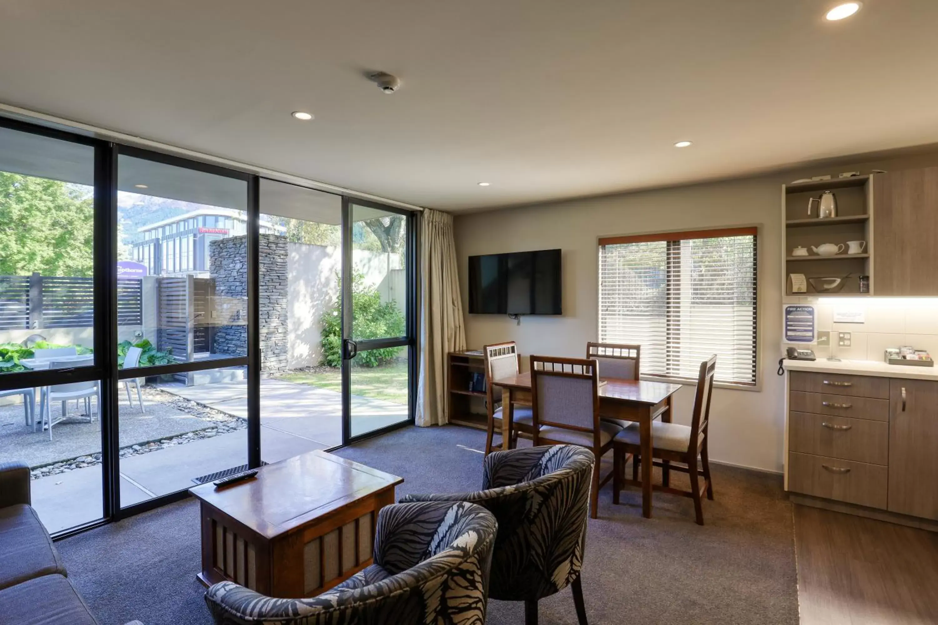 Living room, Dining Area in Garden Court Suites & Apartments