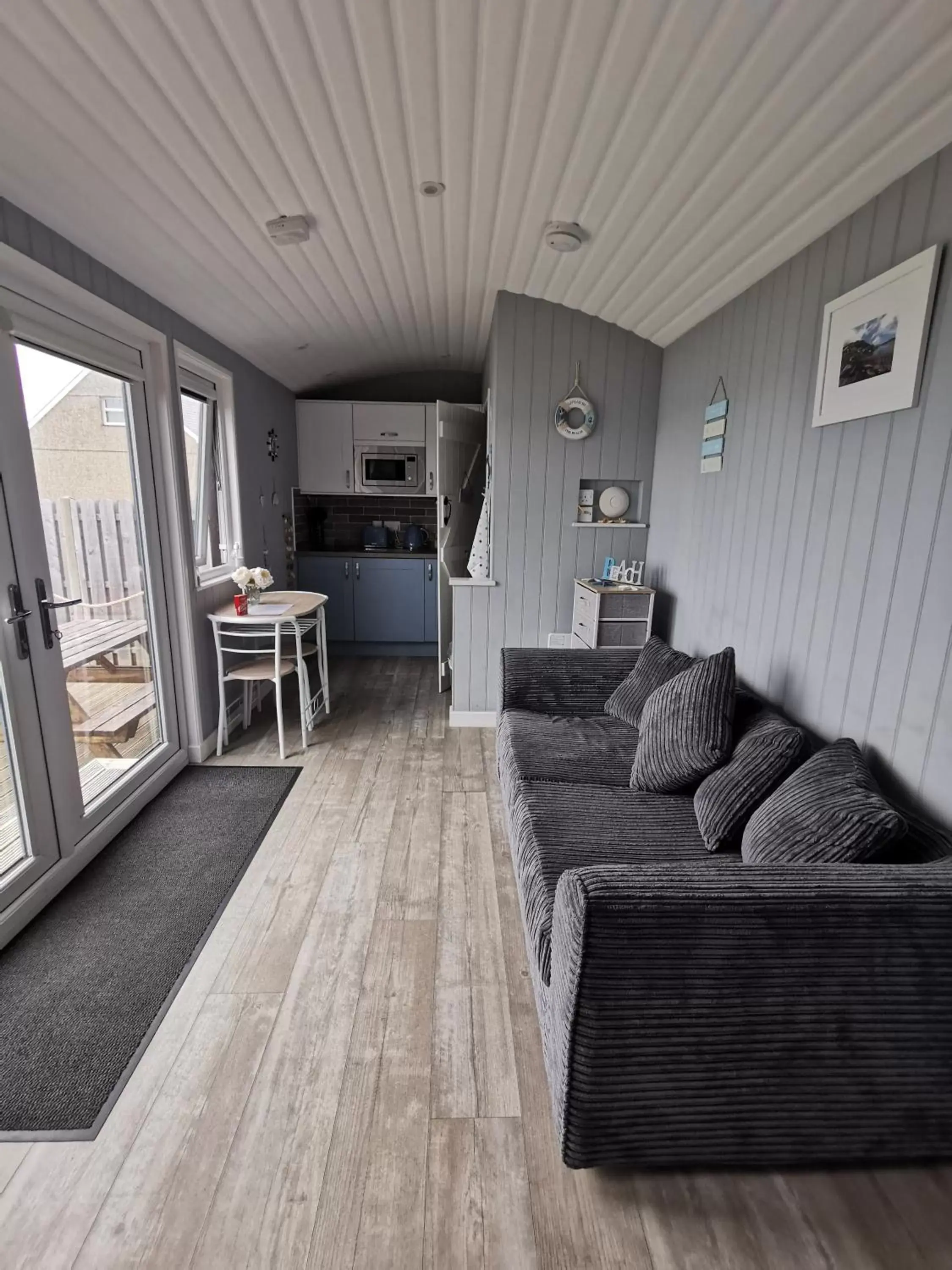 Seating Area in Allibella Shepherds Hut, Amazing Seaview, Private garden, Pet Friendly