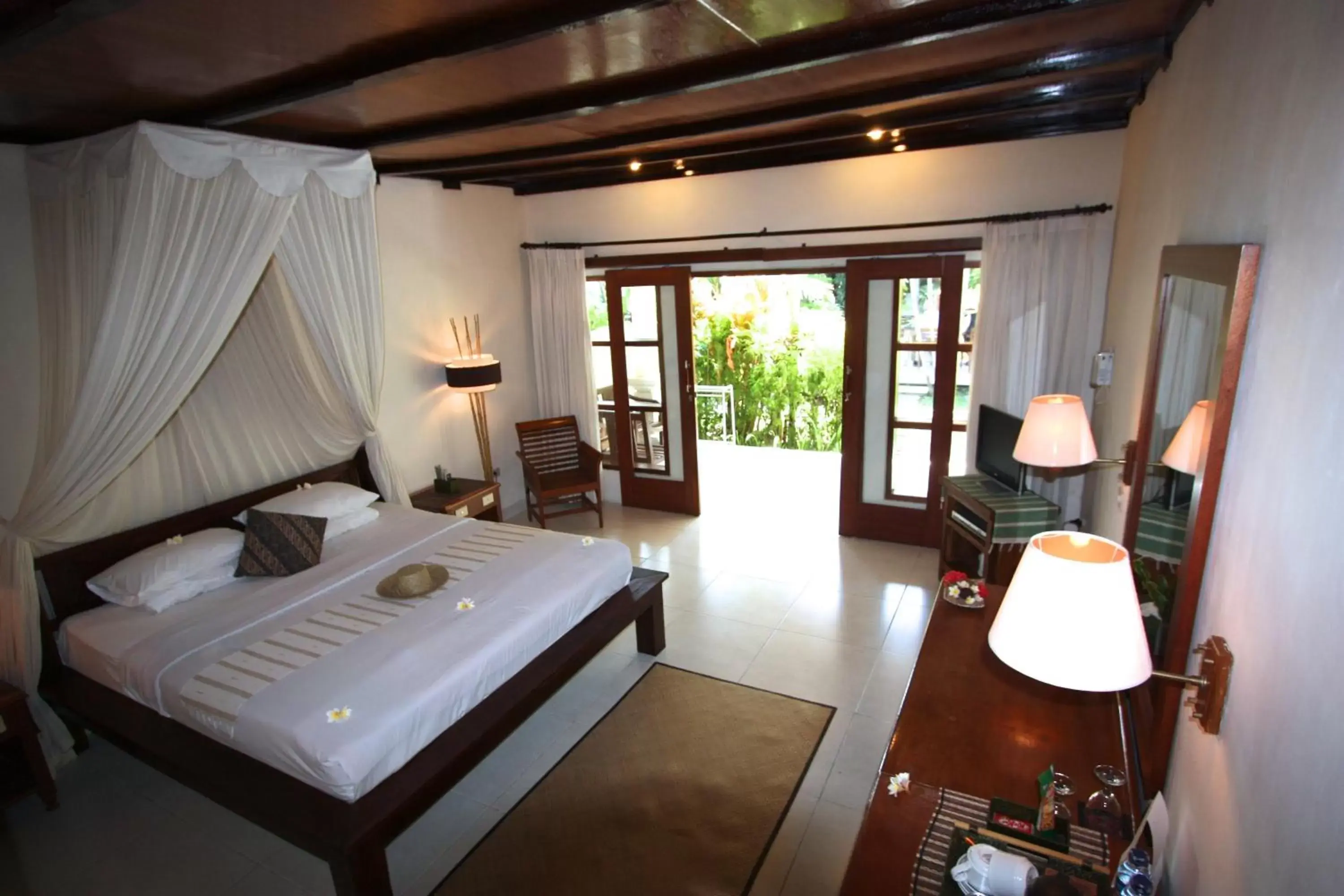 Photo of the whole room, Bed in Bumi Ayu Bungalow Sanur Photo of the whole room, Bed in Bumi Ayu Bungalow Sanur