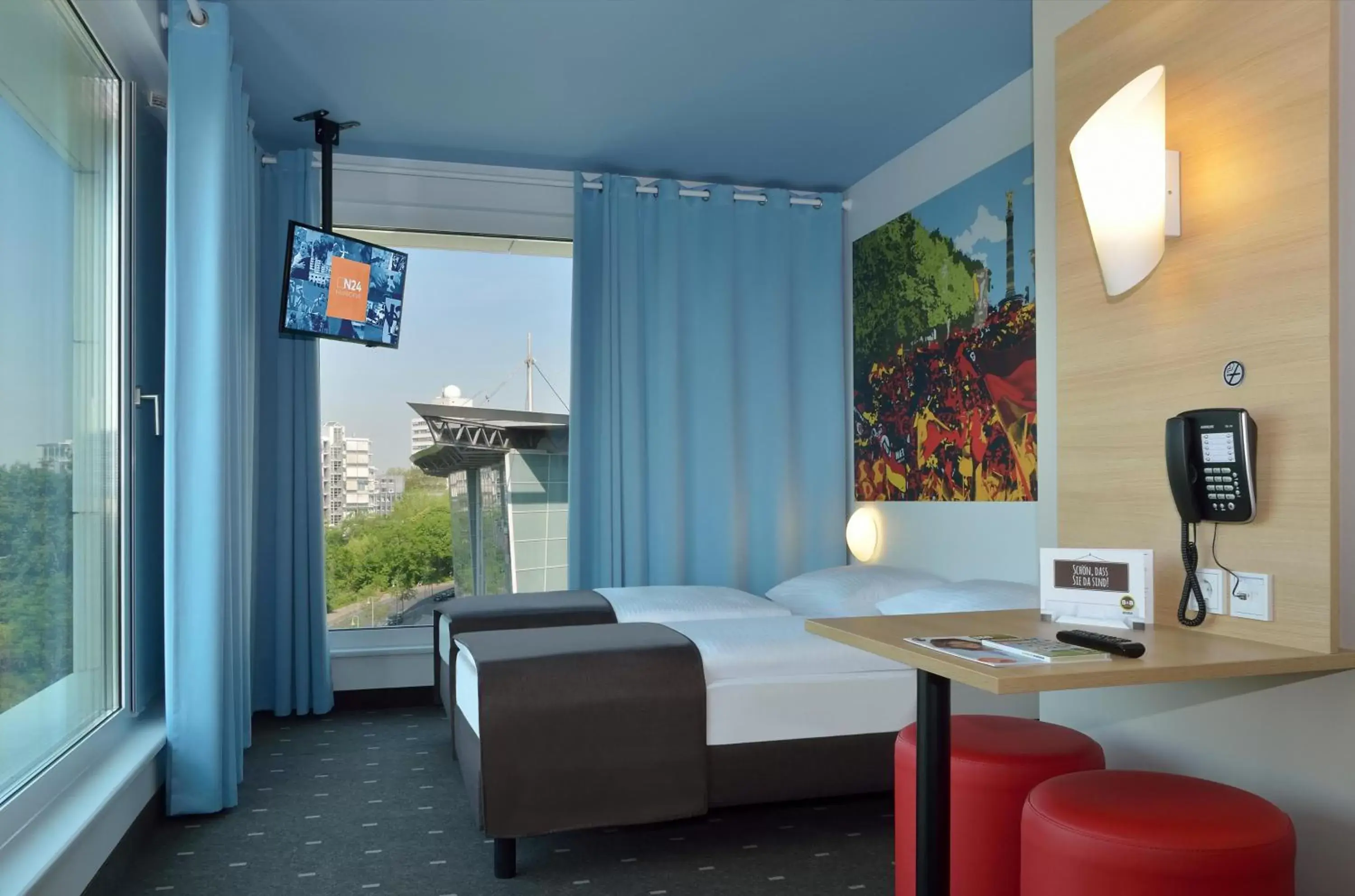 Photo of the whole room, TV/Entertainment Center in B&B Hotel Berlin-Tiergarten