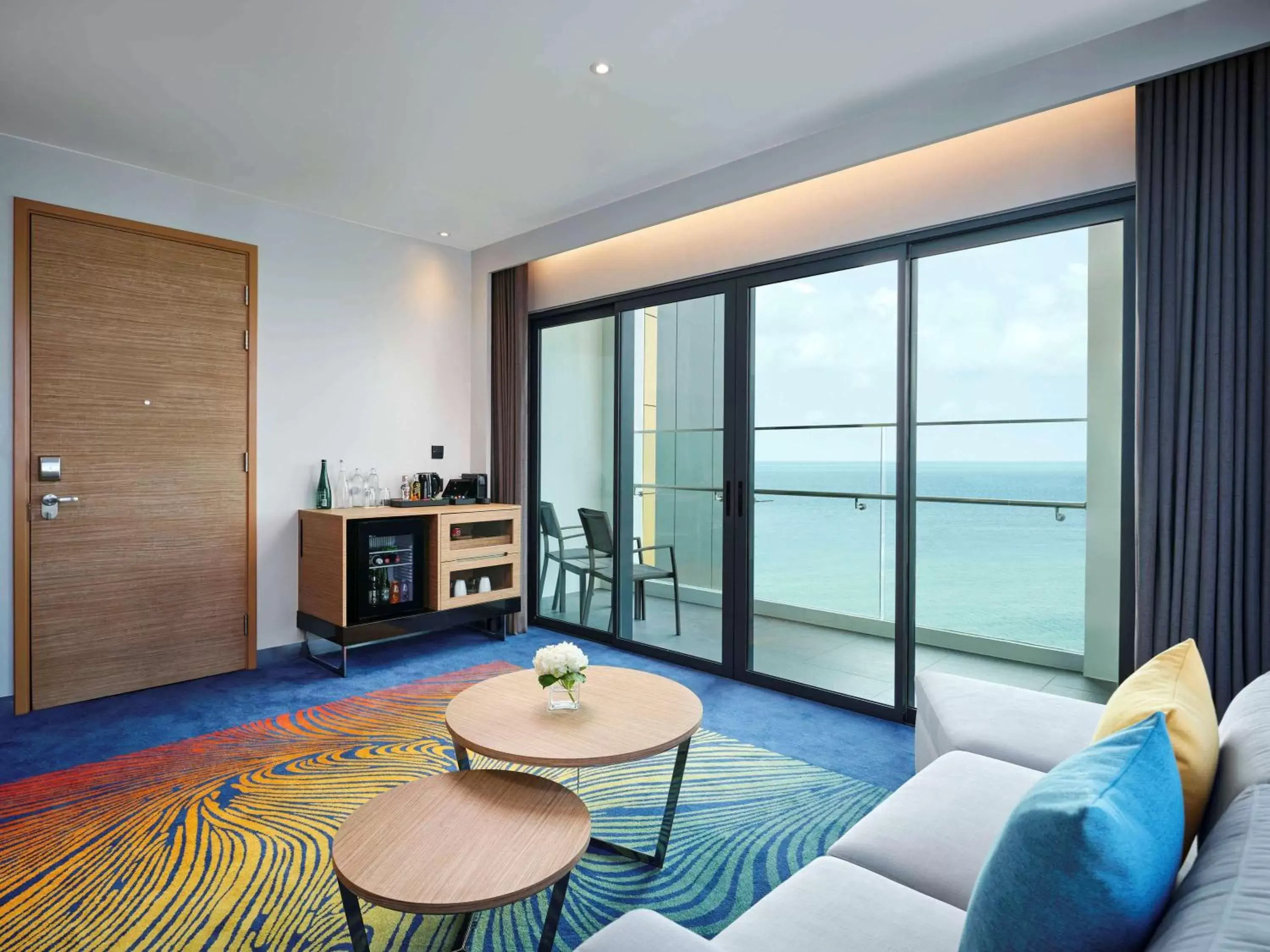 Photo of the whole room, Seating Area in Novotel Marina Sriracha & Koh Si Chang