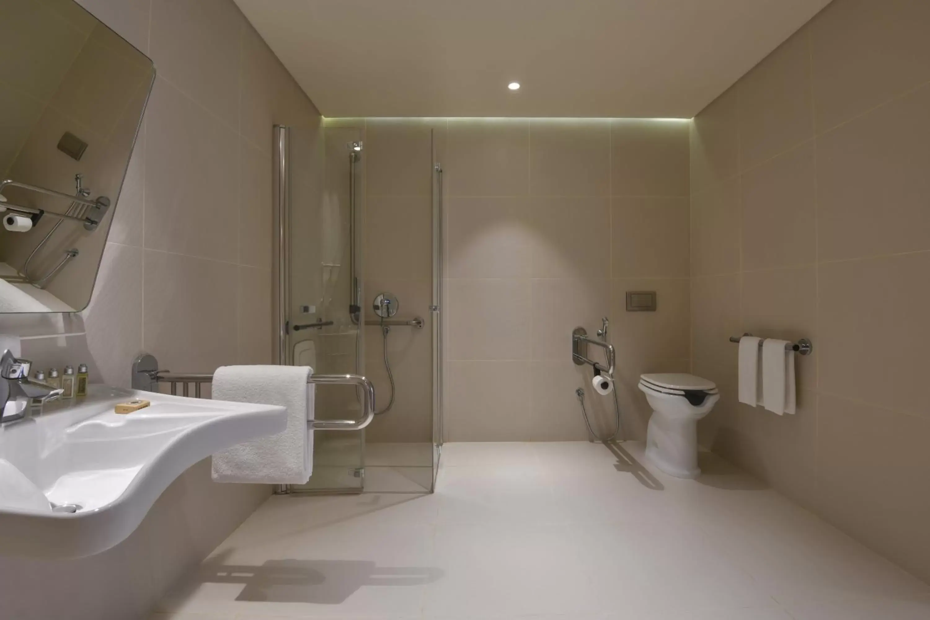 Bathroom in voco Doha West Bay Suites, an IHG Hotel