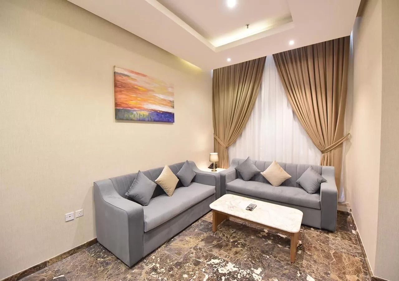 Communal lounge/ TV room, Seating Area in Rihanna Hotel Apartment