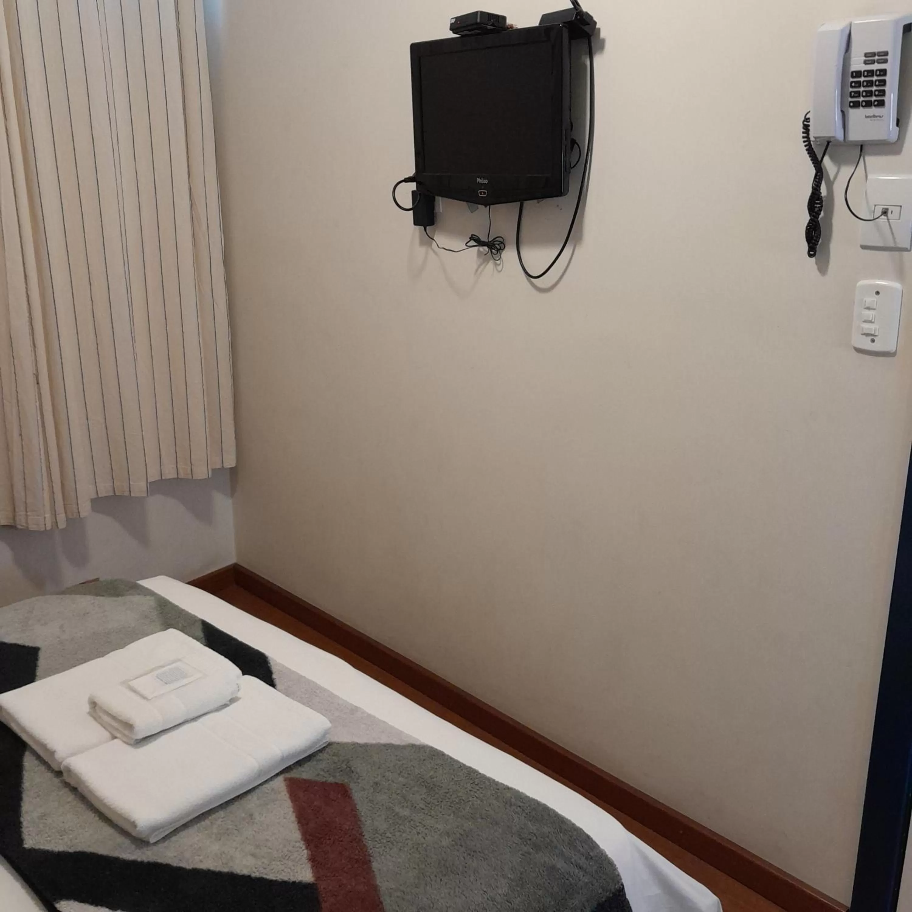 Bed, TV/Entertainment Center in Hotel Barroco Mineiro