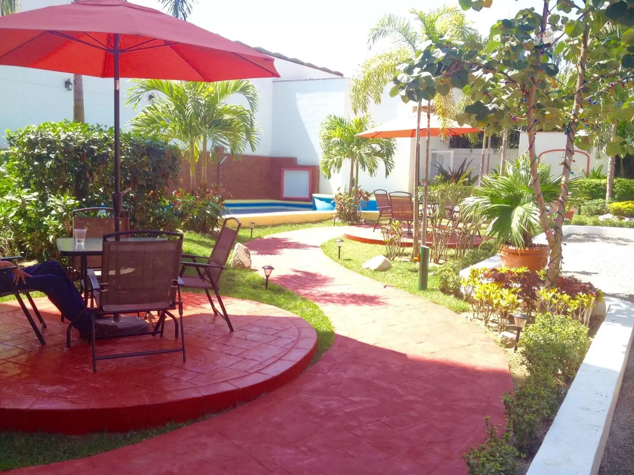 Patio, Swimming Pool in Hotel y Suites Los Encantos