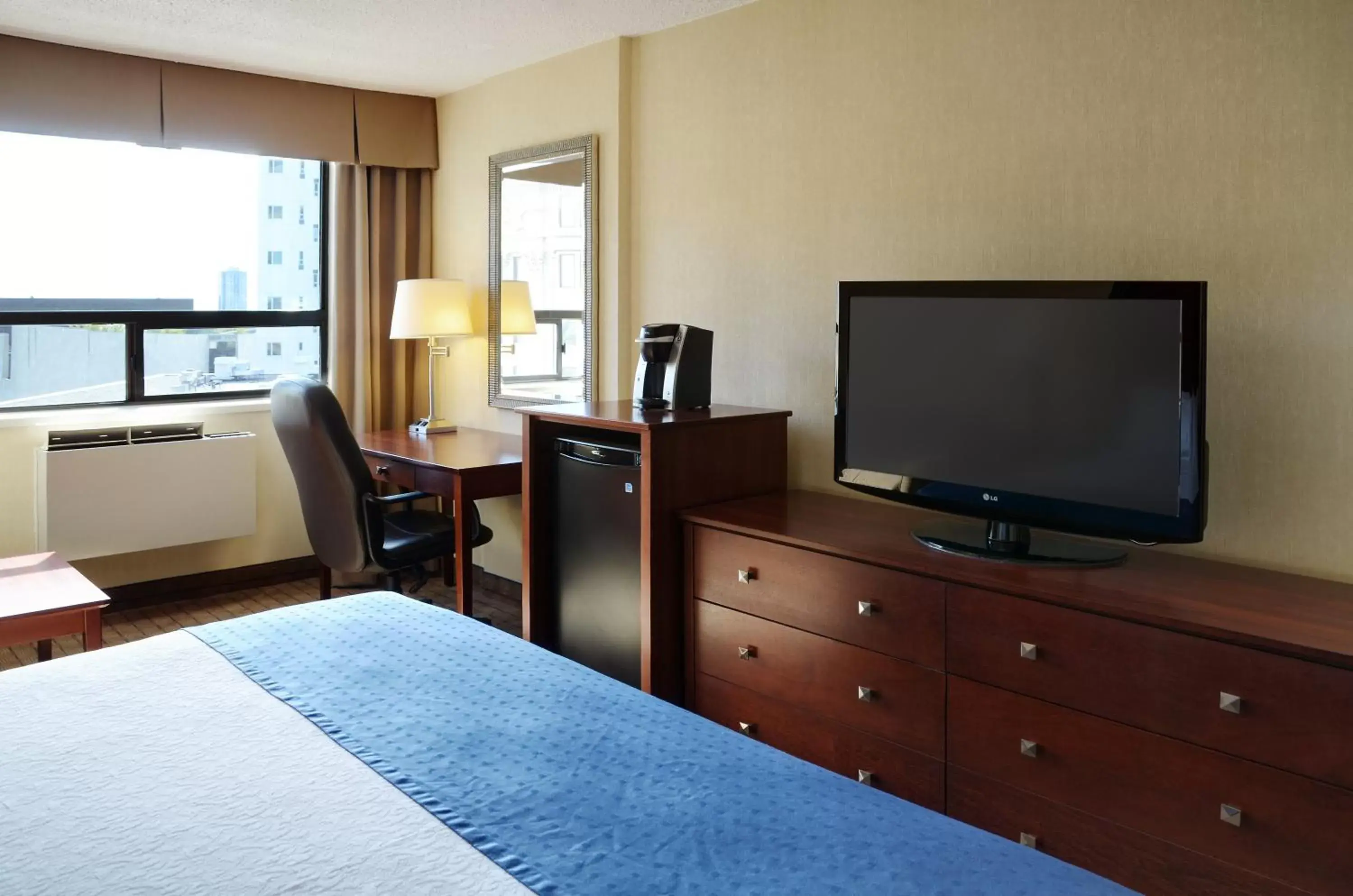 Photo of the whole room, TV/Entertainment Center in Holiday Inn & Suites Winnipeg Downtown, an IHG Hotel
