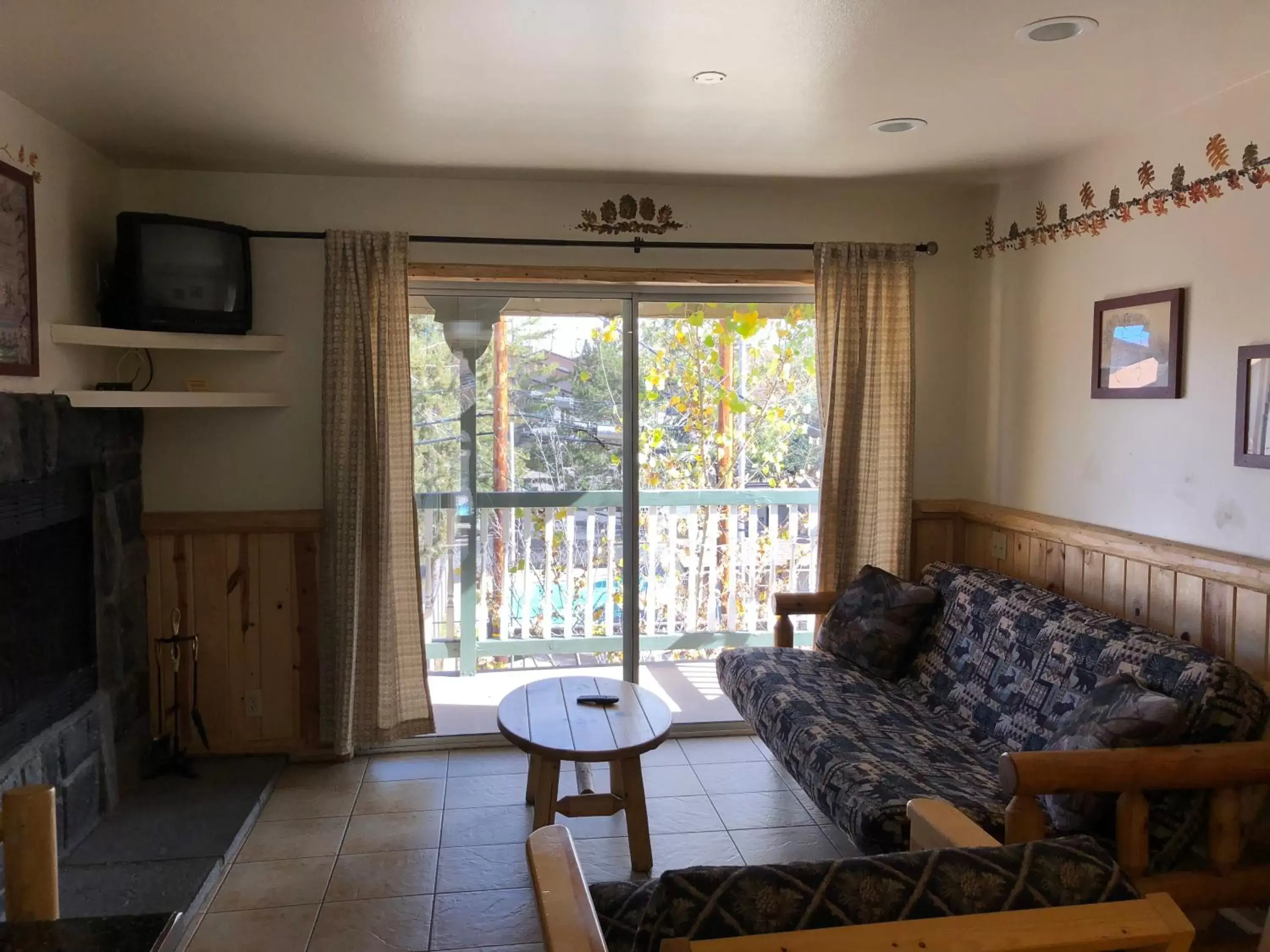 Bed, Seating Area in Fireside Lodge