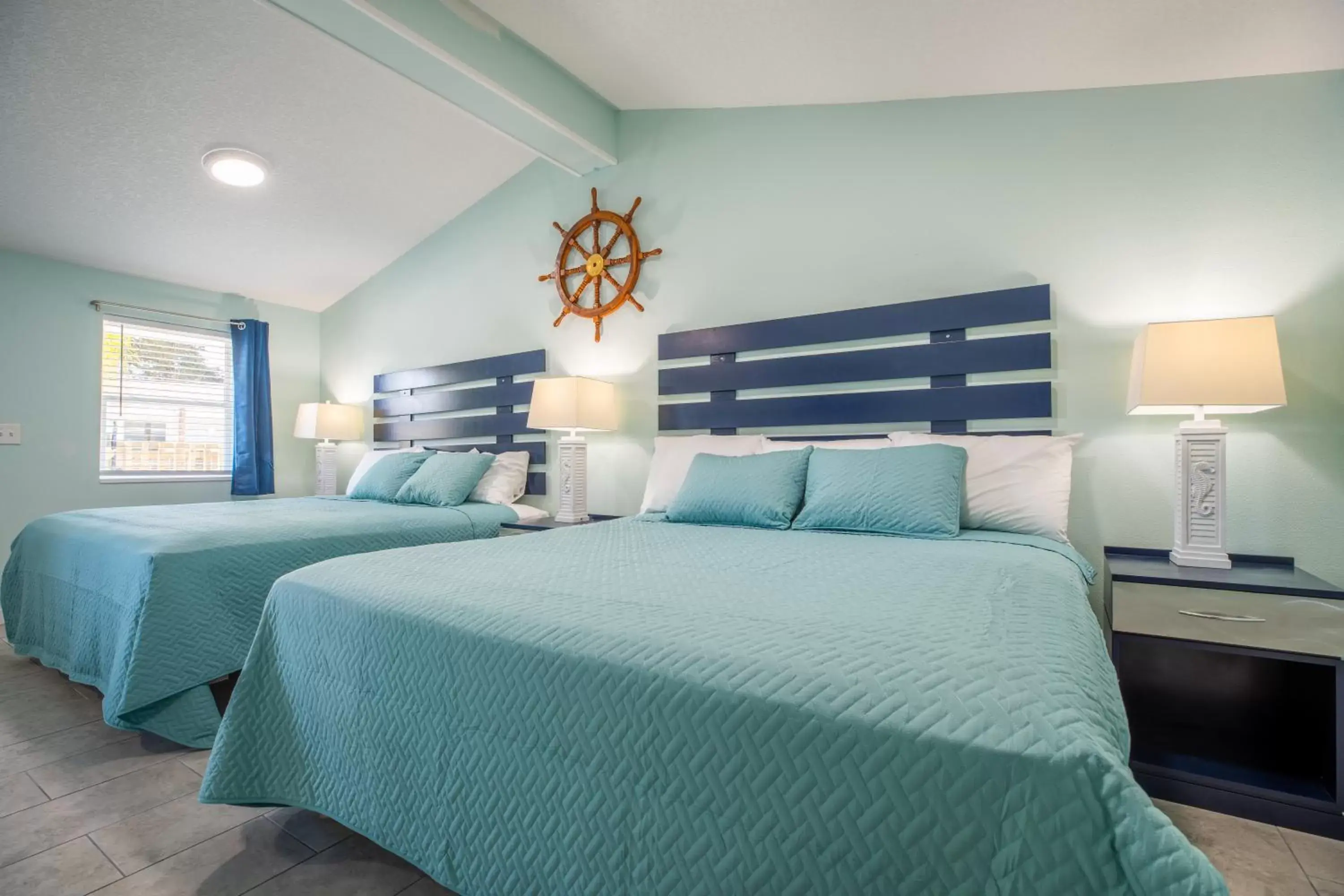 Bed in Salt Air Inn & Suites
