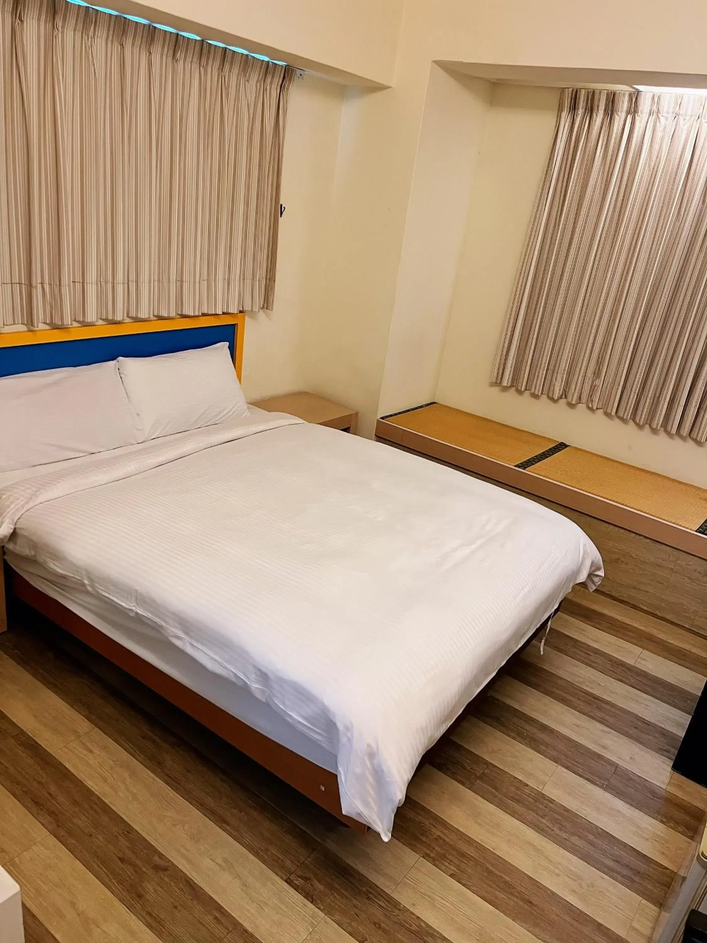 Bed in Hwa Hong Hotel