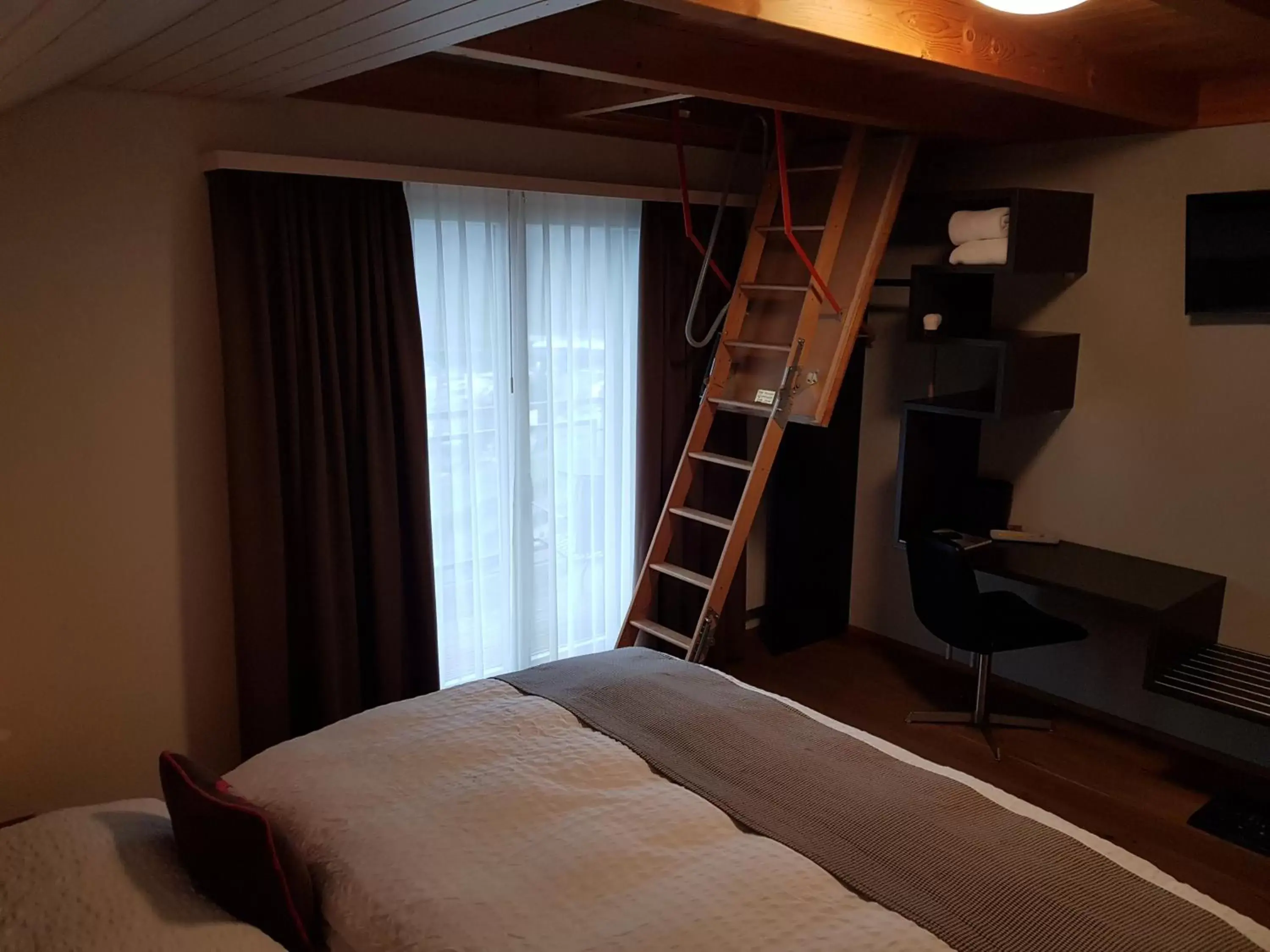 Photo of the whole room, Bed in Hotel Roggerli