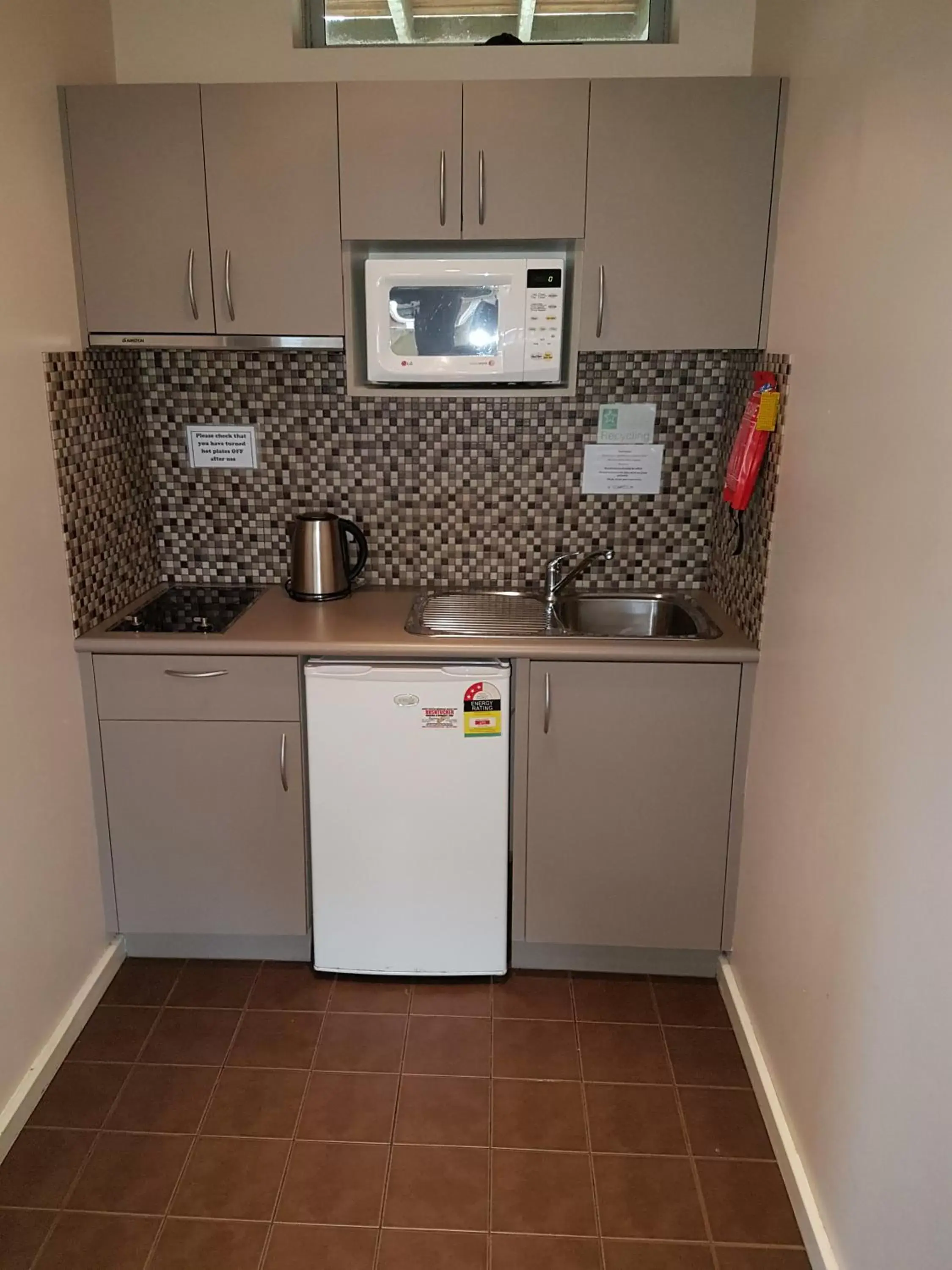 Kitchen/Kitchenette in Adamsons Riverside Accommodation