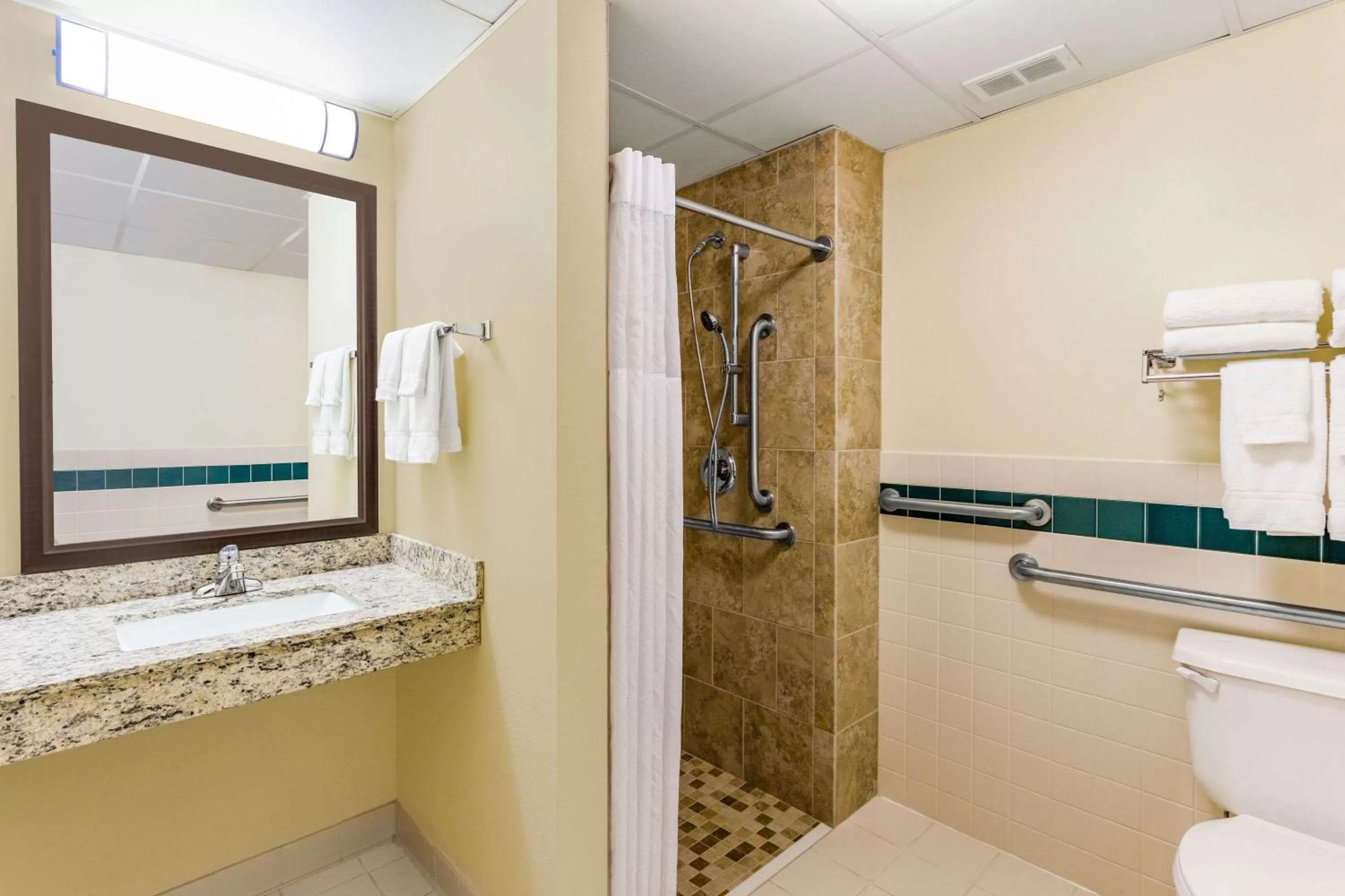 Shower in AmericInn by Wyndham Princeton MN