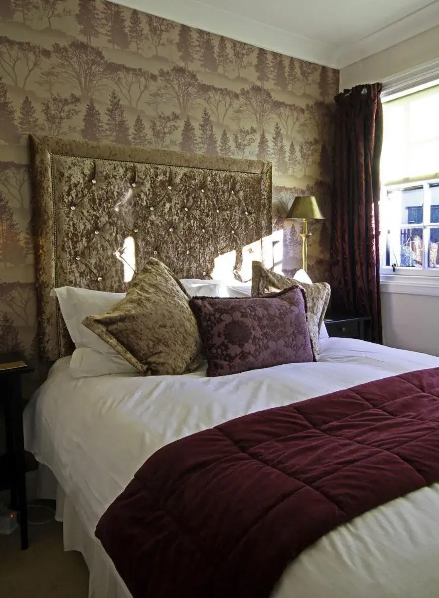 Bed in The Horseshoe Inn