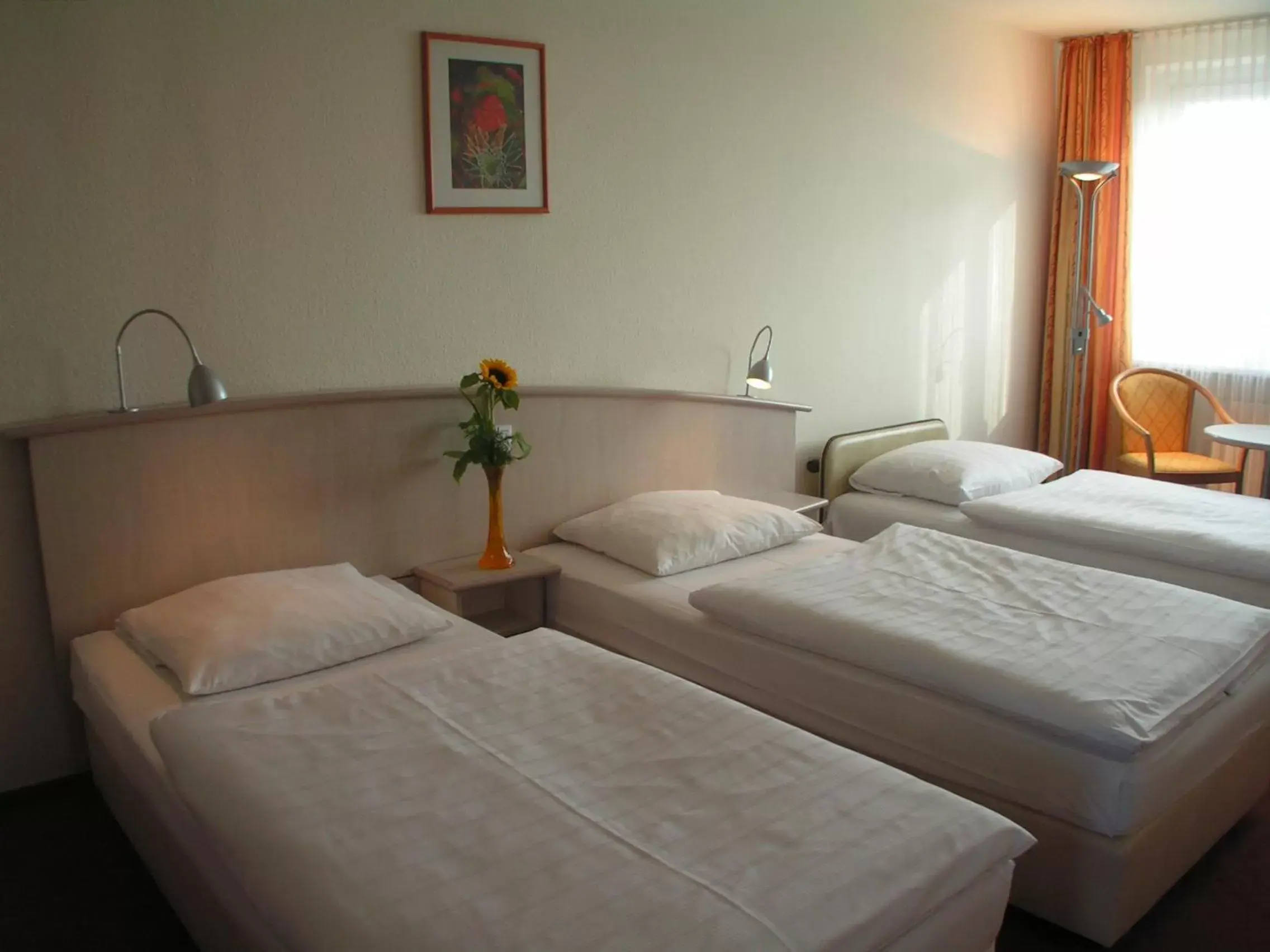 Bed in Panorama Inn Hotel