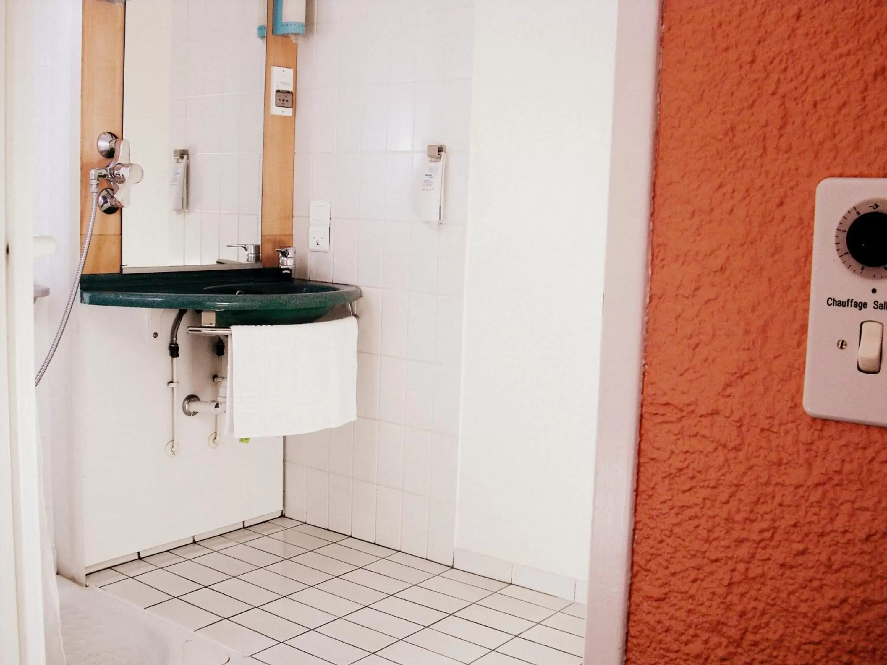 Bathroom in Brit Hotel Mulhouse Centre
