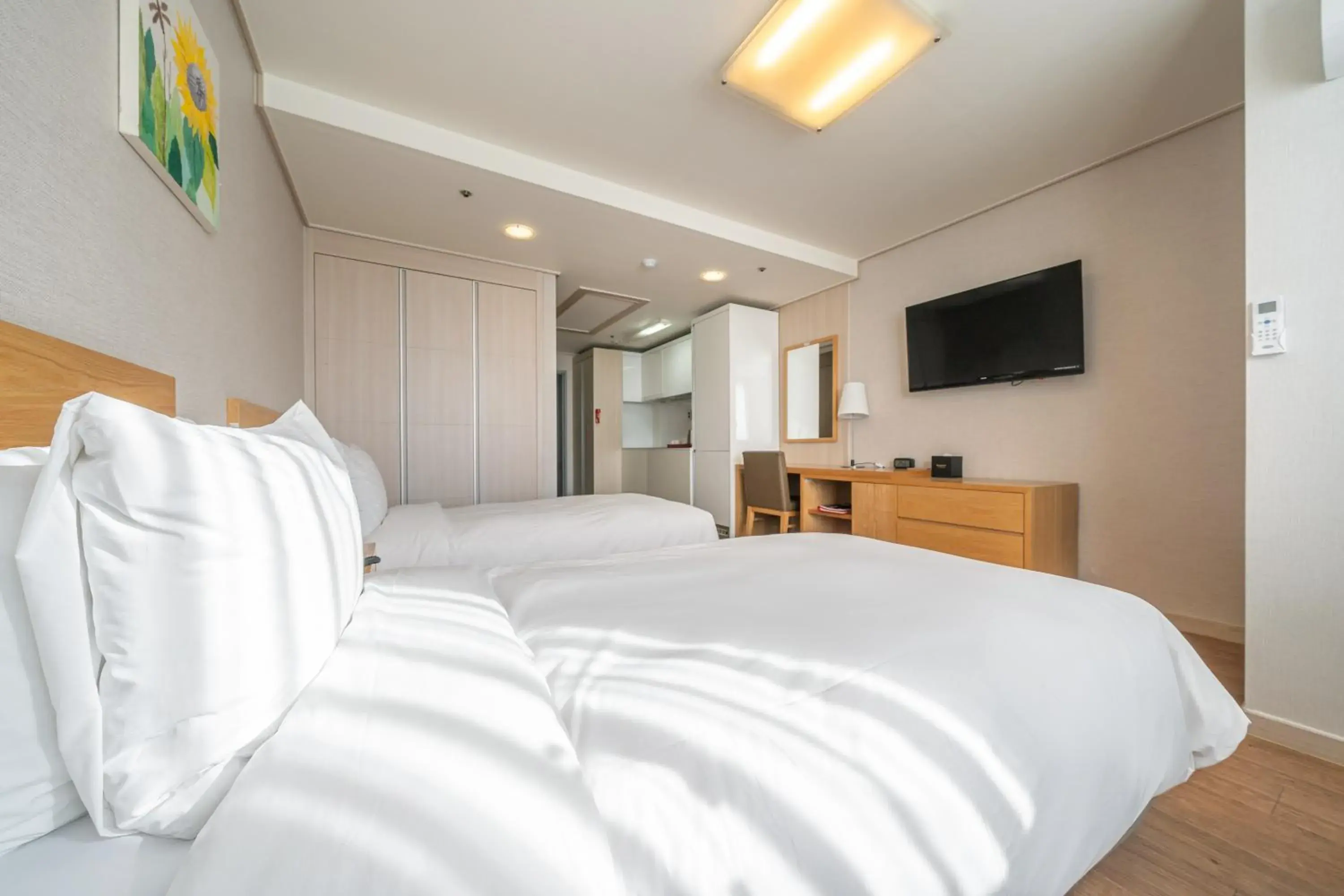 Bed in Ramada by Wyndham Seoul Dongdaemun