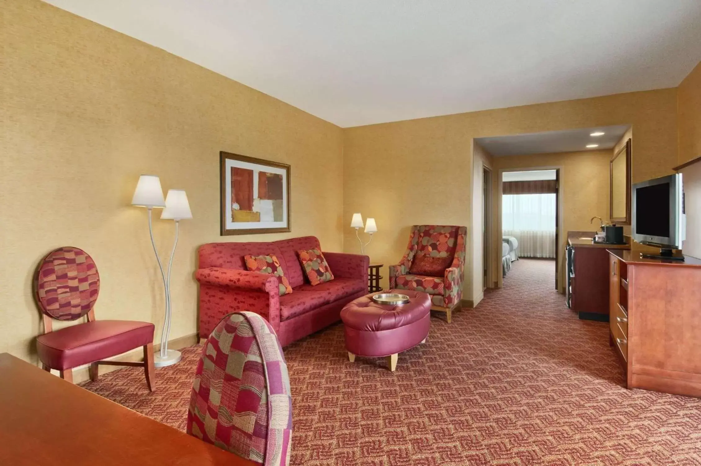 Living room, Seating Area in Embassy Suites by Hilton Charlotte Concord Golf Resort & Spa