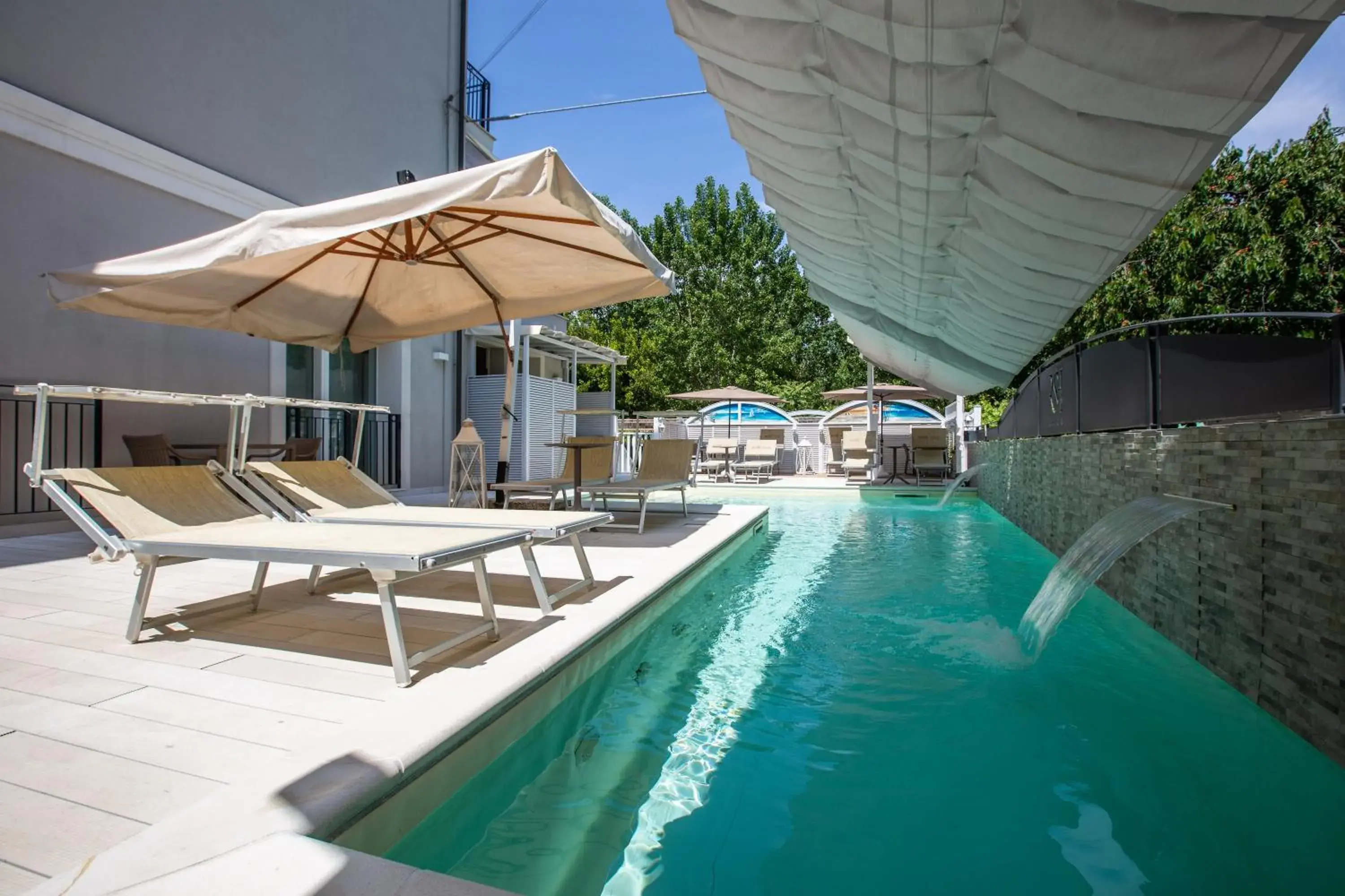 Garden, Swimming Pool in Rimini Suite Hotel