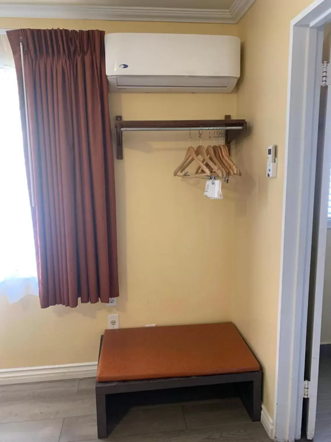 air conditioner, Bed in Oasis Inn and Suites