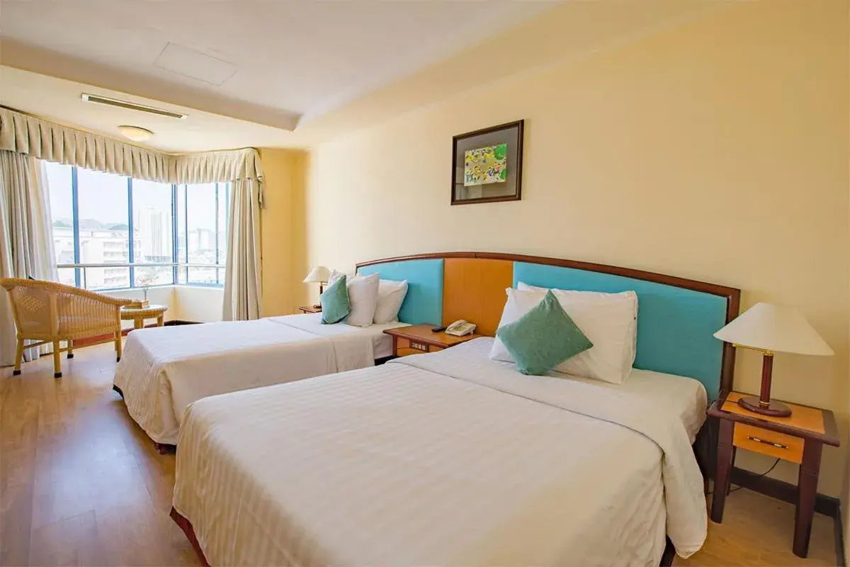 Bed in Yasaka Saigon Resort Hotel & Spa