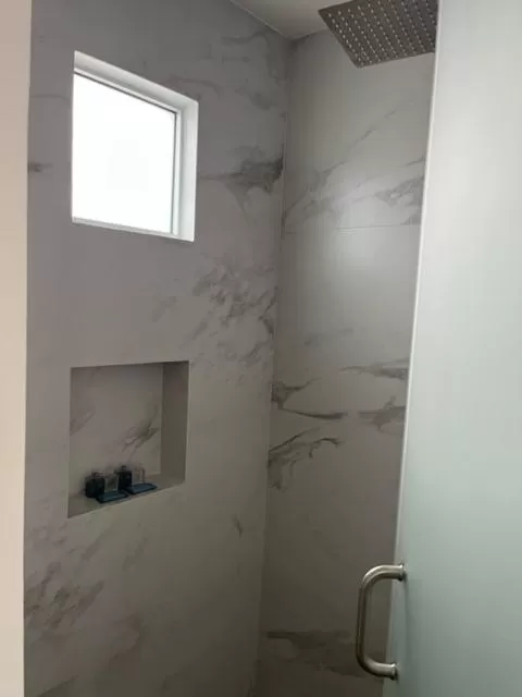 Shower in The Cove Boutique Hotel Adults Only