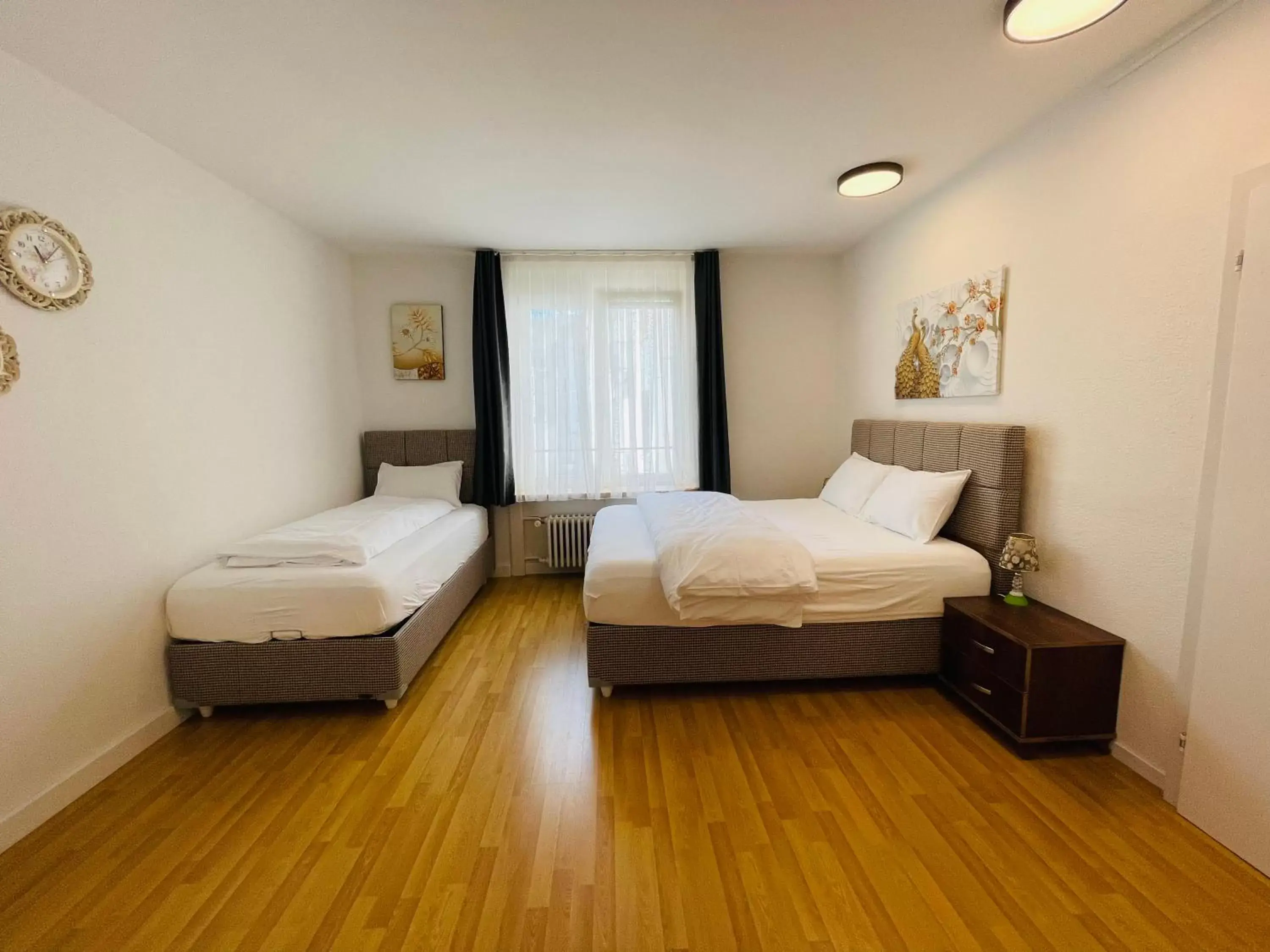 Triple Room in Akomo Bern Triple Room in Akomo Bern