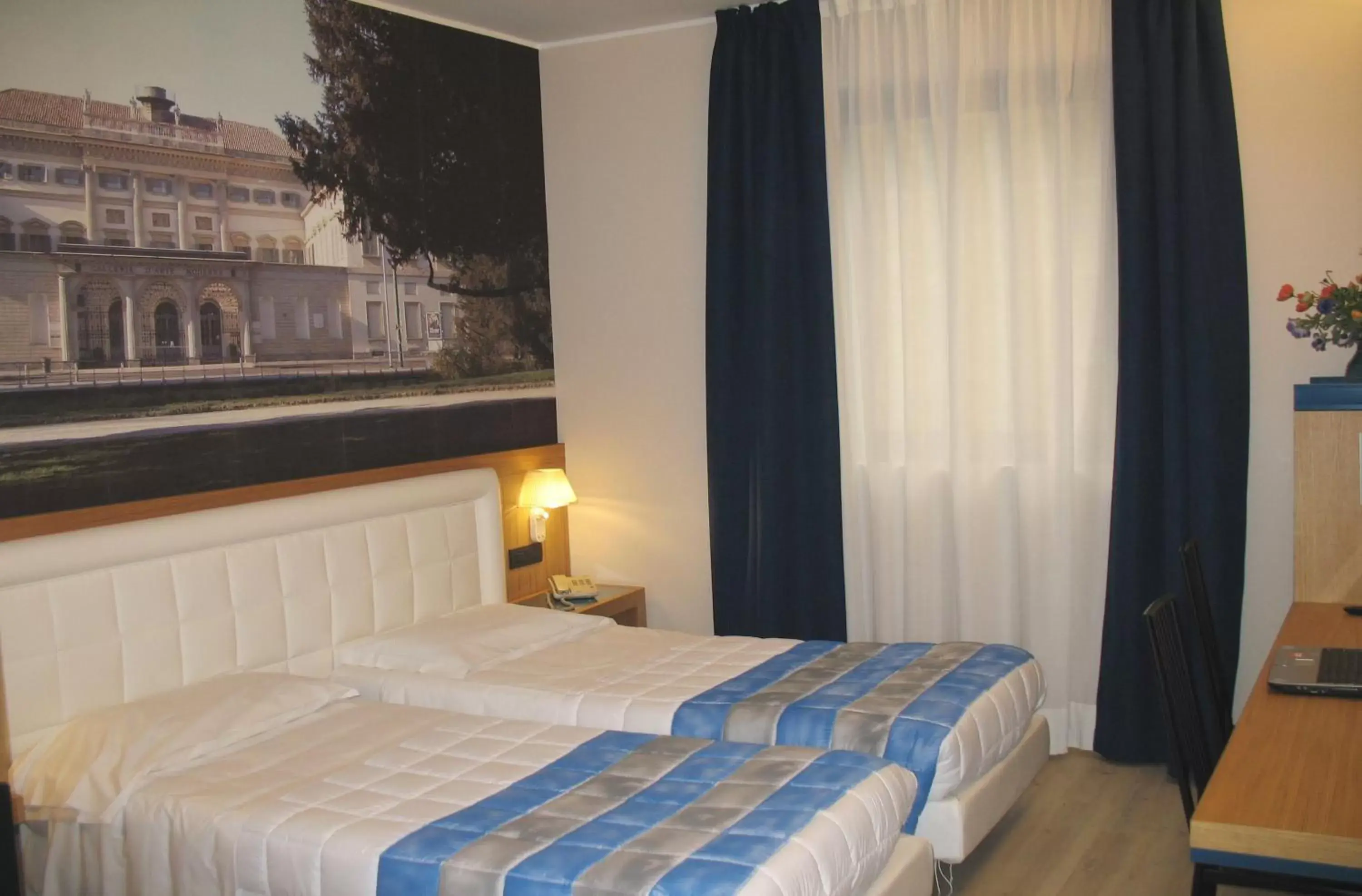 Bed in Hotel Domenichino