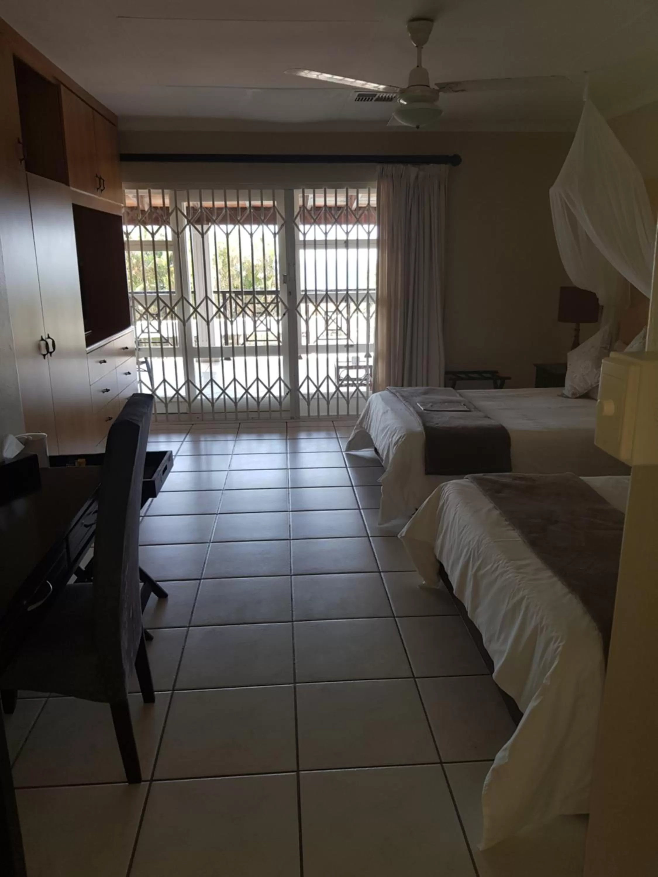 Bed in Ingwe Manor Guesthouse