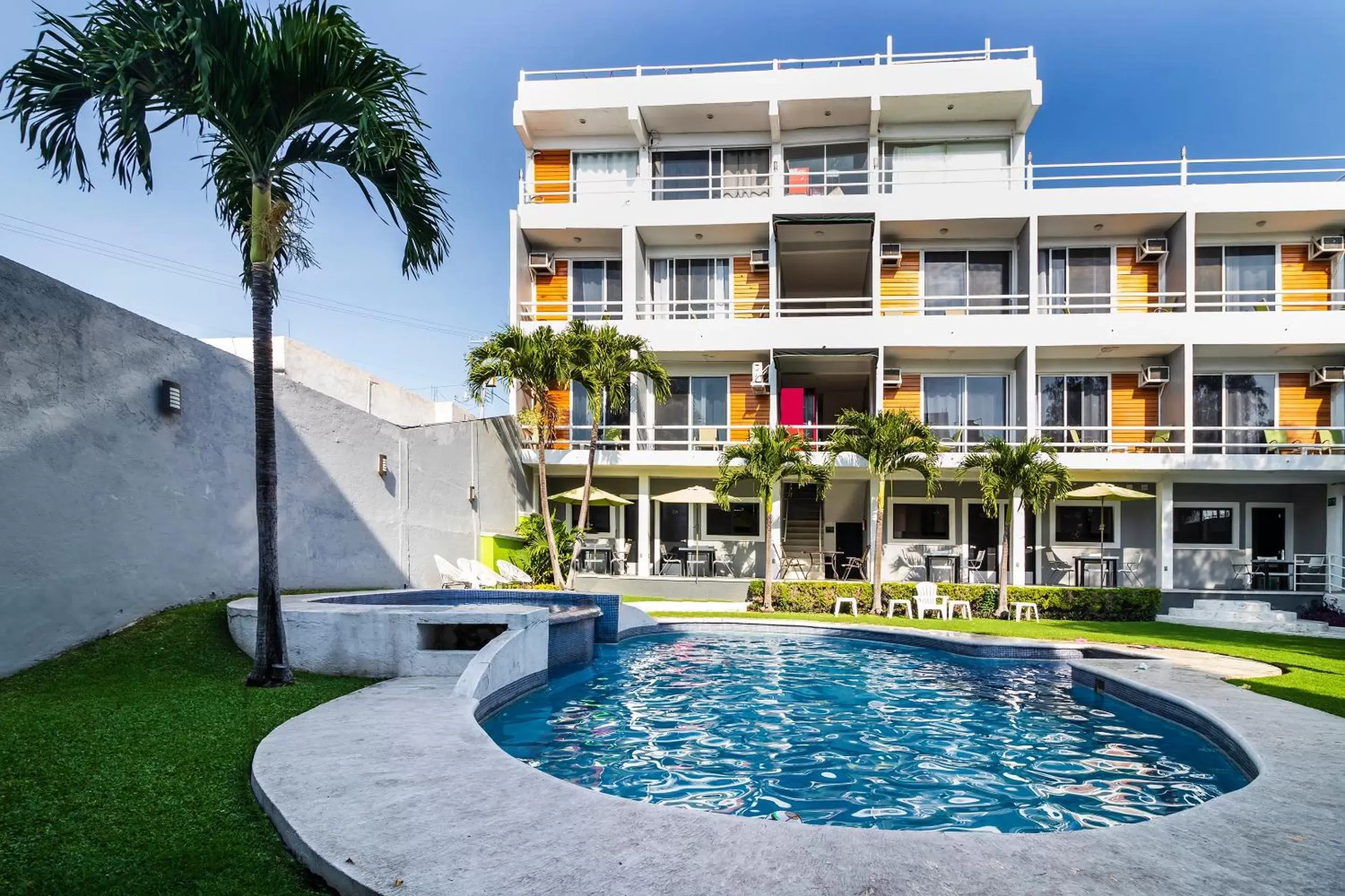 Swimming pool, Property Building in Collection O Hotel Mango,Six Flags Hurricane Harbor Oaxtepec