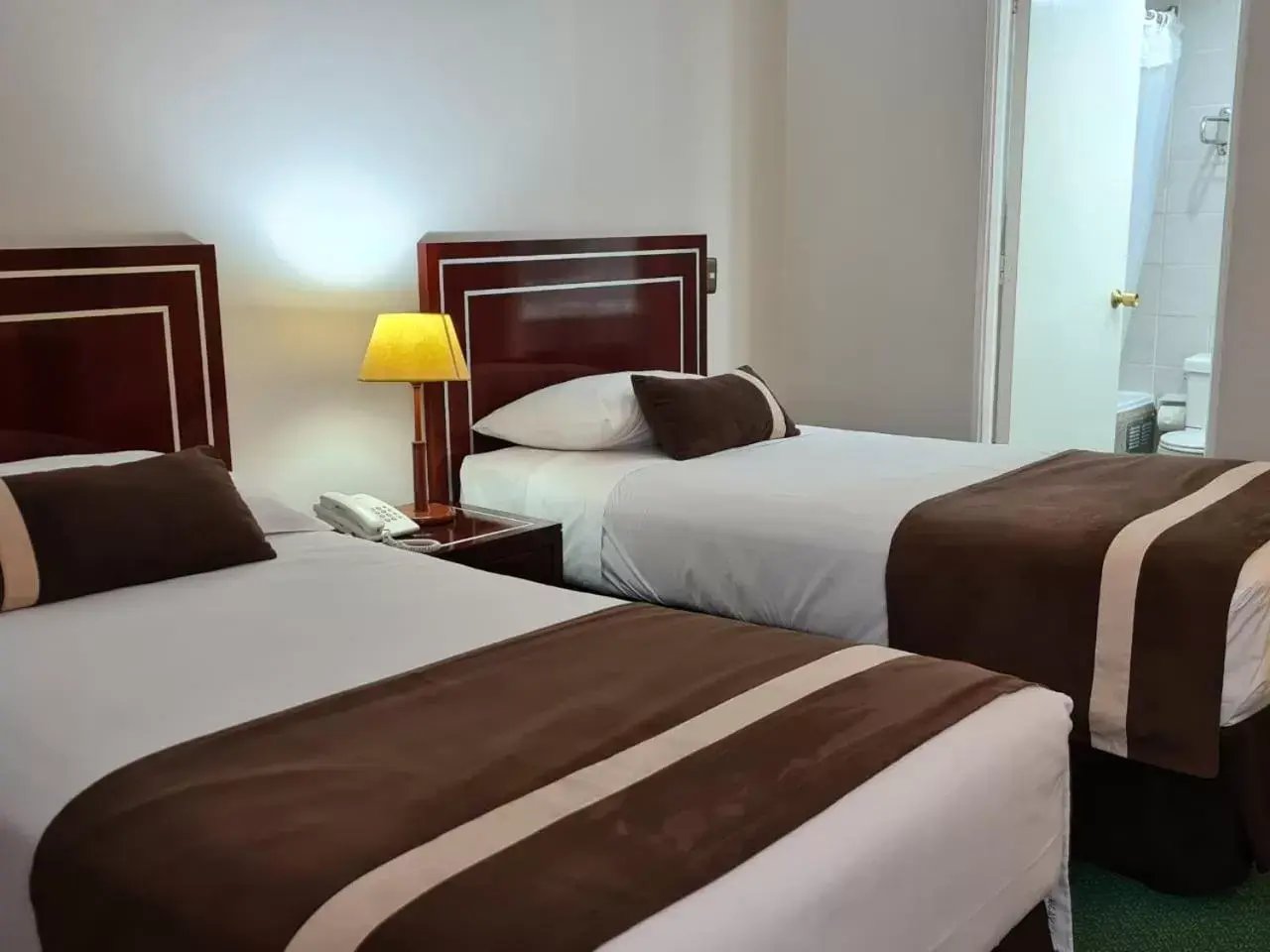 Bed in Hotel Leonardo da Vinci Bed in Hotel Leonardo da Vinci