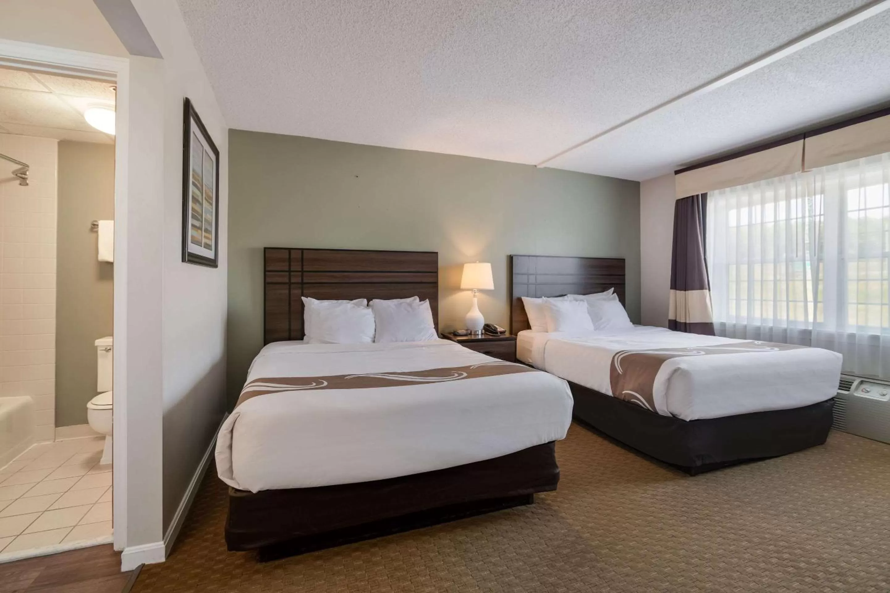 Photo of the whole room, Bed in Quality Inn & Suites