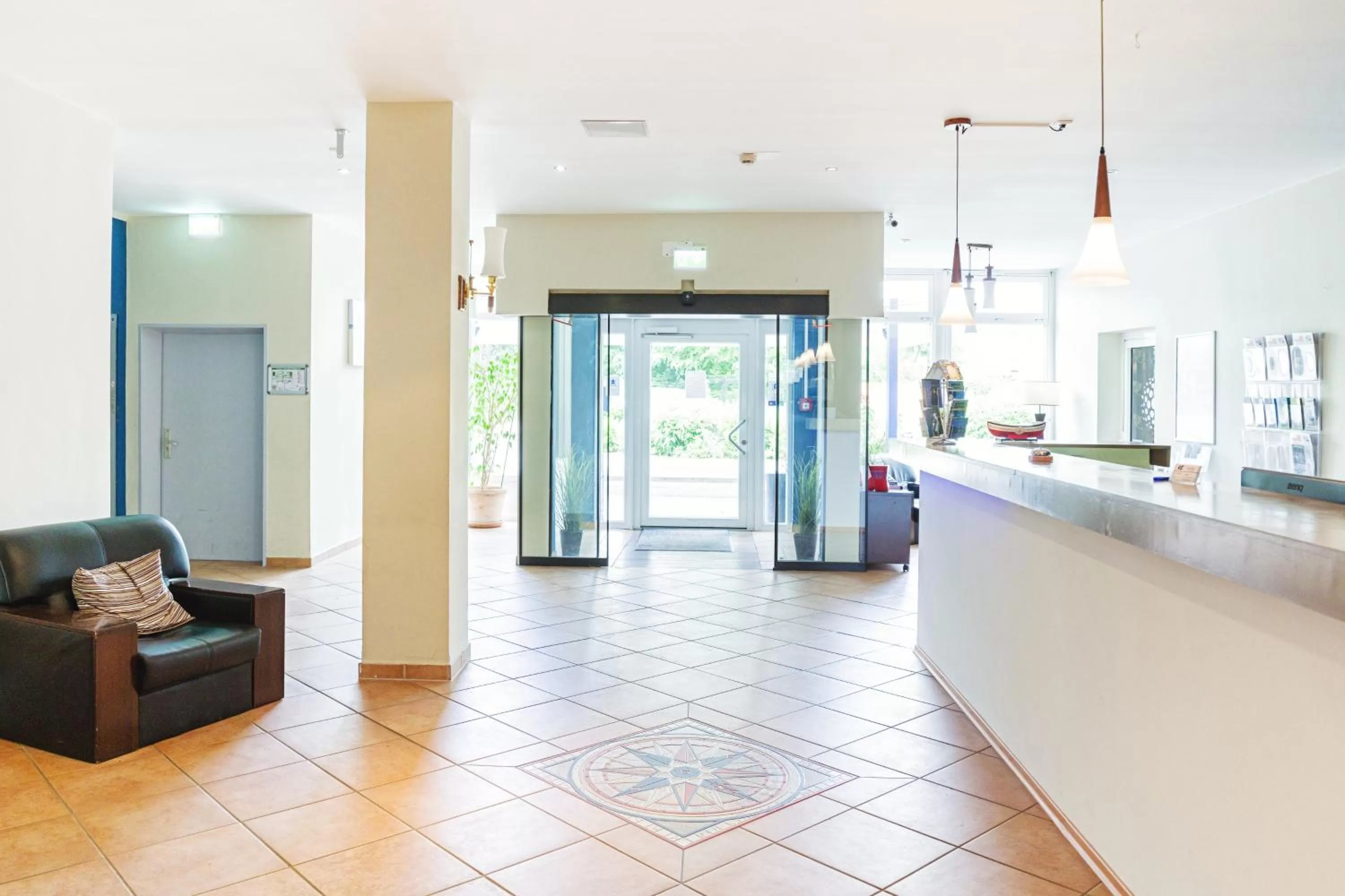 Lobby or reception in Hotel Plöner See by Tulip Inn