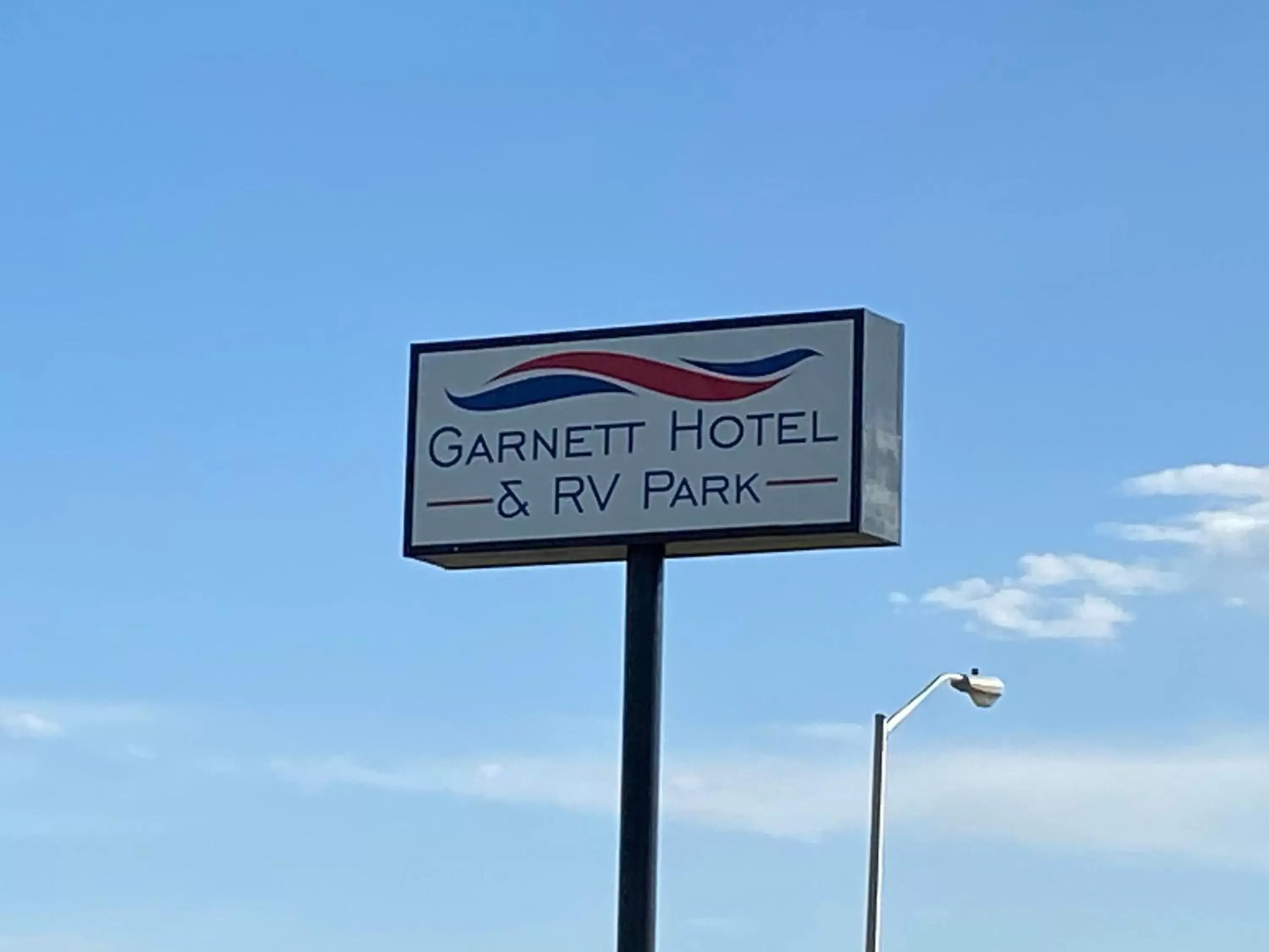 Logo/Certificate/Sign in Garnett Hotel & RV Park