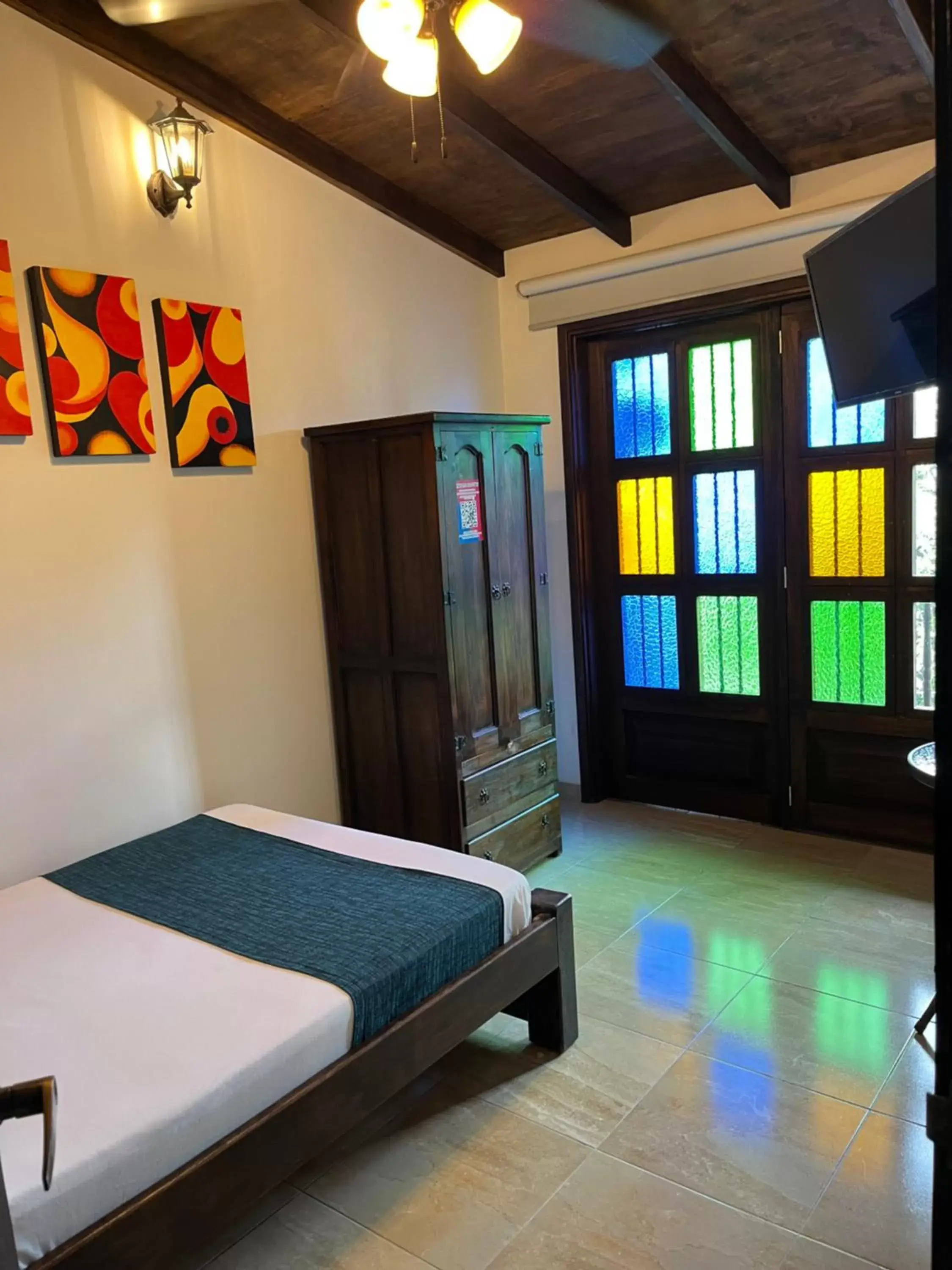 Photo of the whole room, Bed in Santiago DC Hotel Photo of the whole room, Bed in Santiago DC Hotel