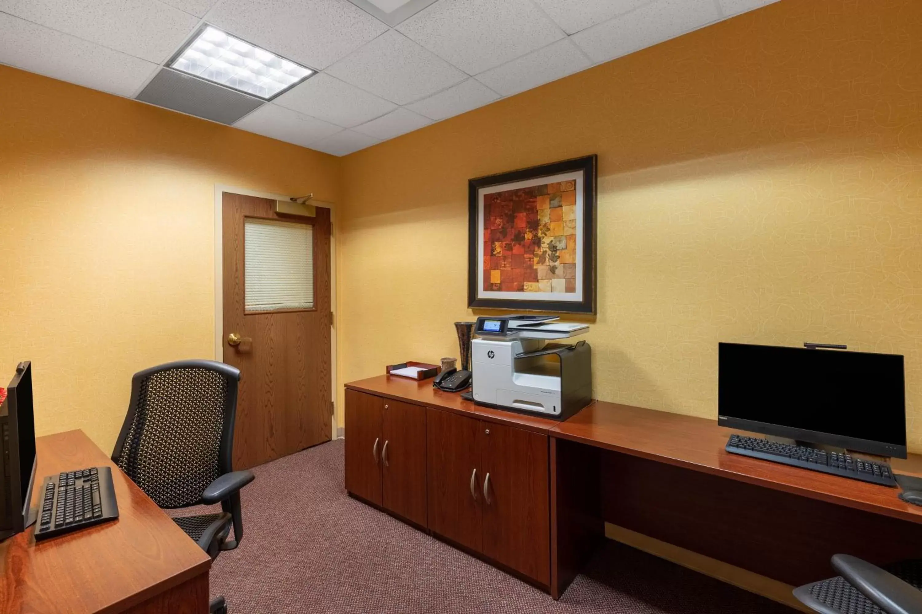Business facilities, TV/Entertainment Center in Wyndham Grand Oklahoma City Downtown