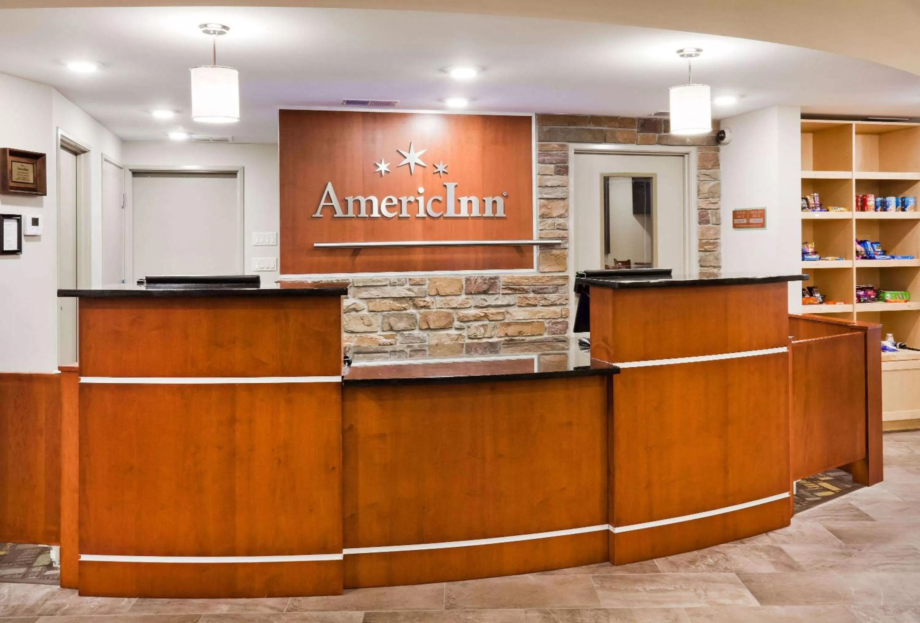 Lobby or reception in AmericInn by Wyndham DeWitt