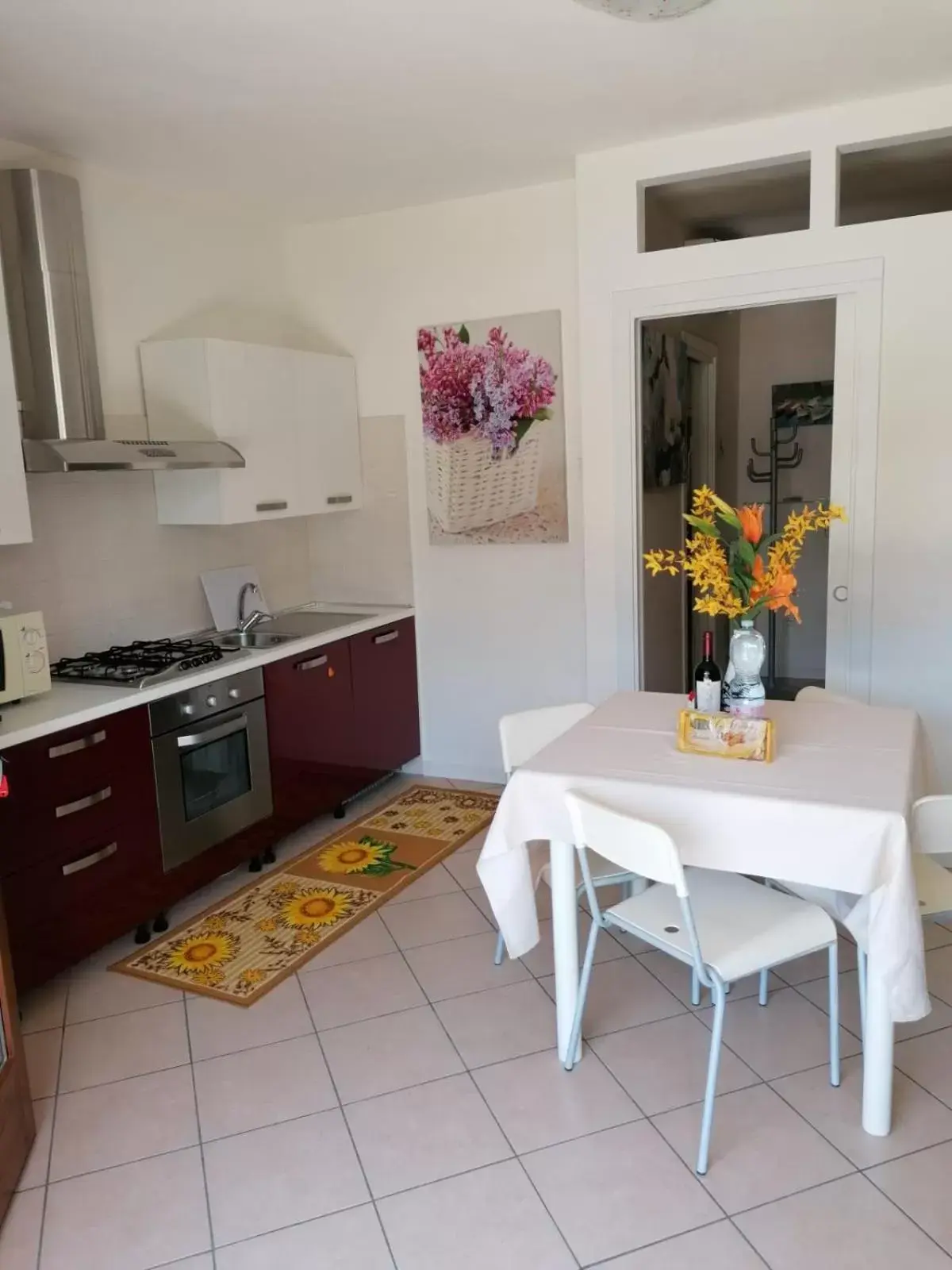 Dining area, Kitchen/Kitchenette in Villaggio dei Fiori Apart- Hotel 3 Stars - Family Resort