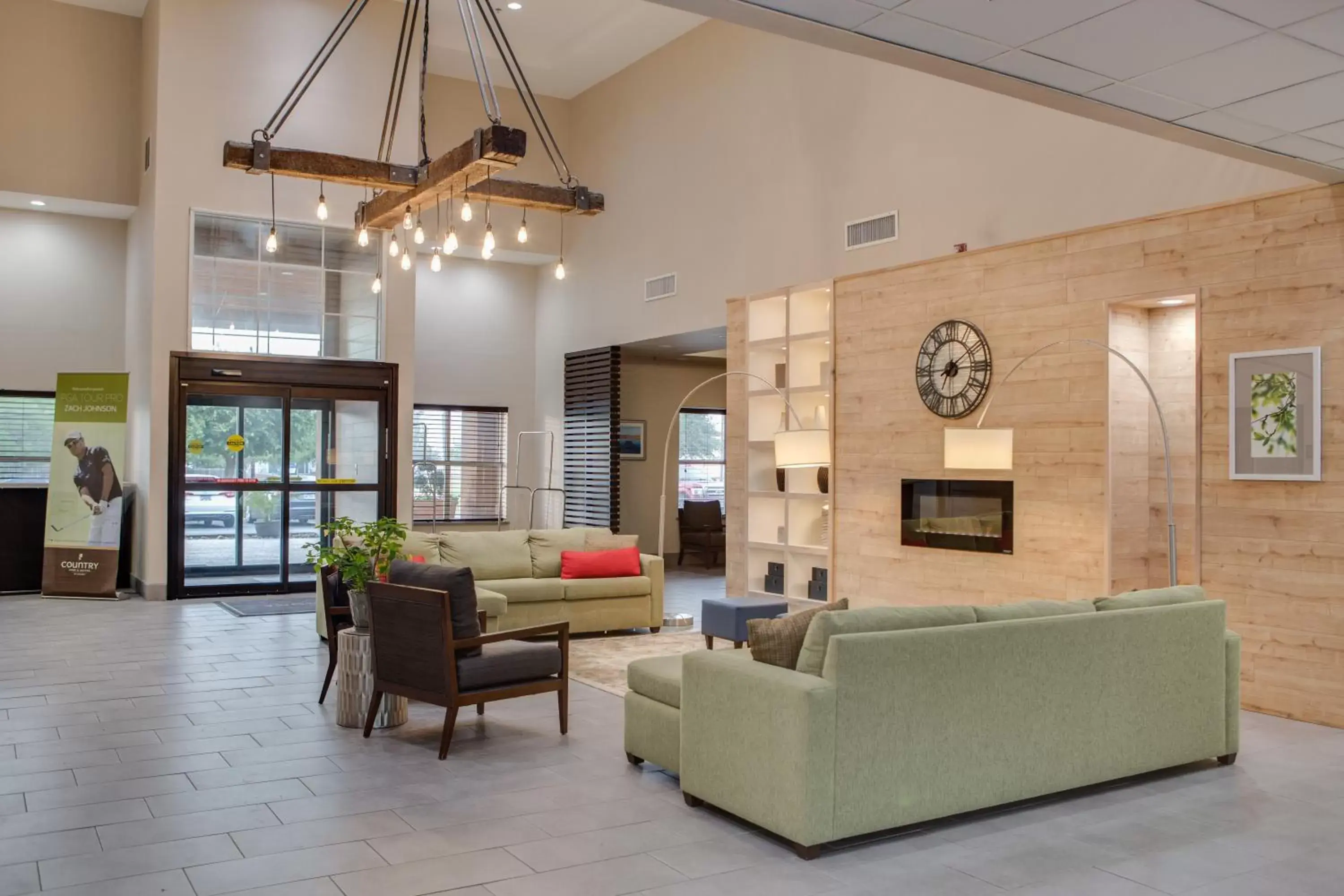 Communal lounge/ TV room, Lobby/Reception in Country Inn & Suites by Radisson, Harlingen, TX
