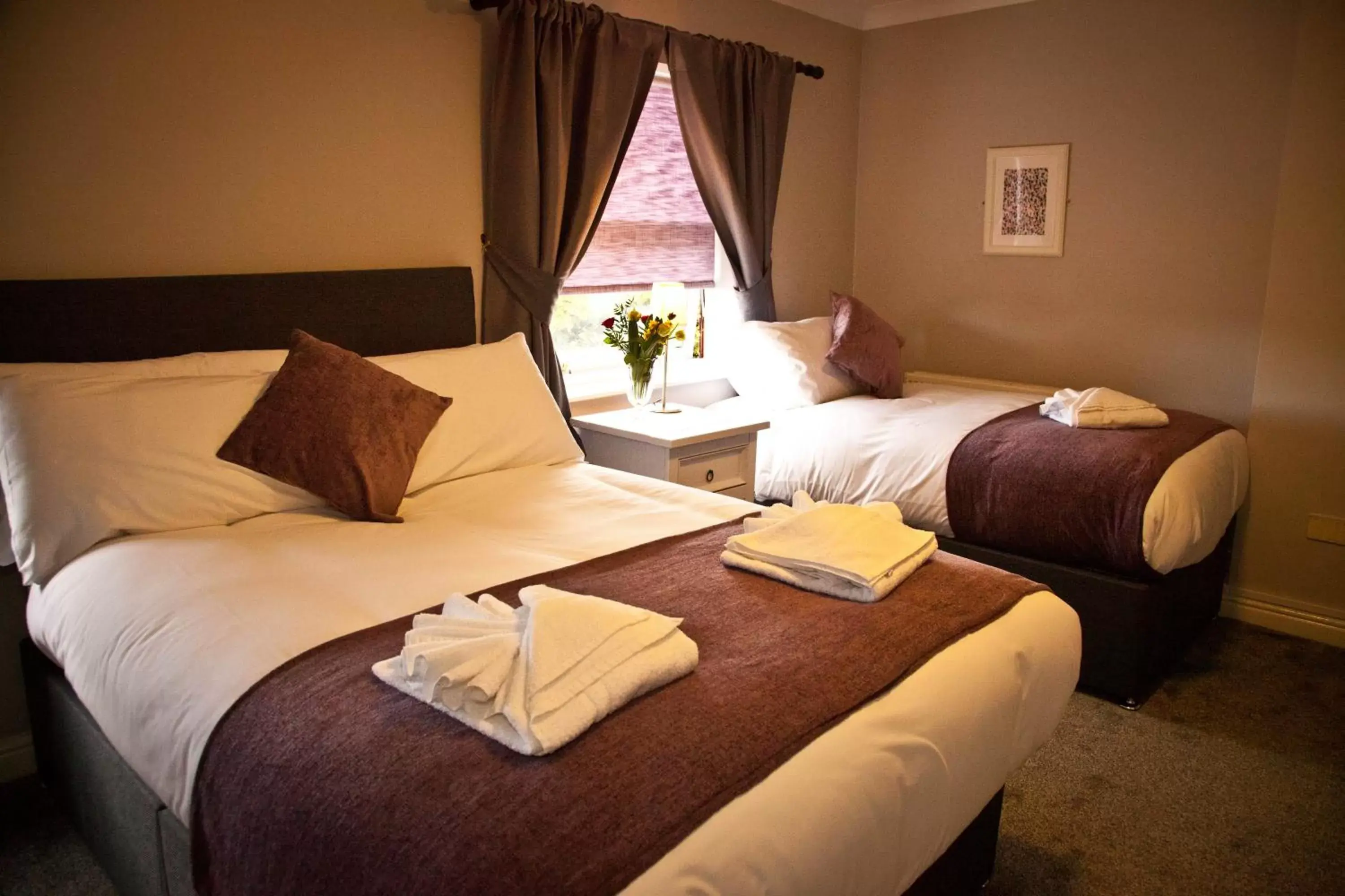 Bed in Rowton Poplars Hotel