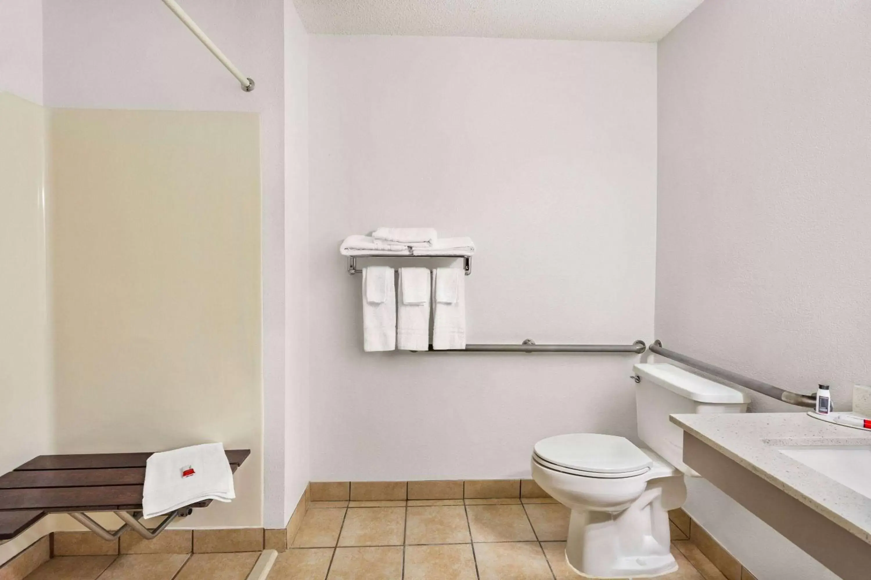 Bathroom in Super 8 by Wyndham Ankeny/Des Moines Area