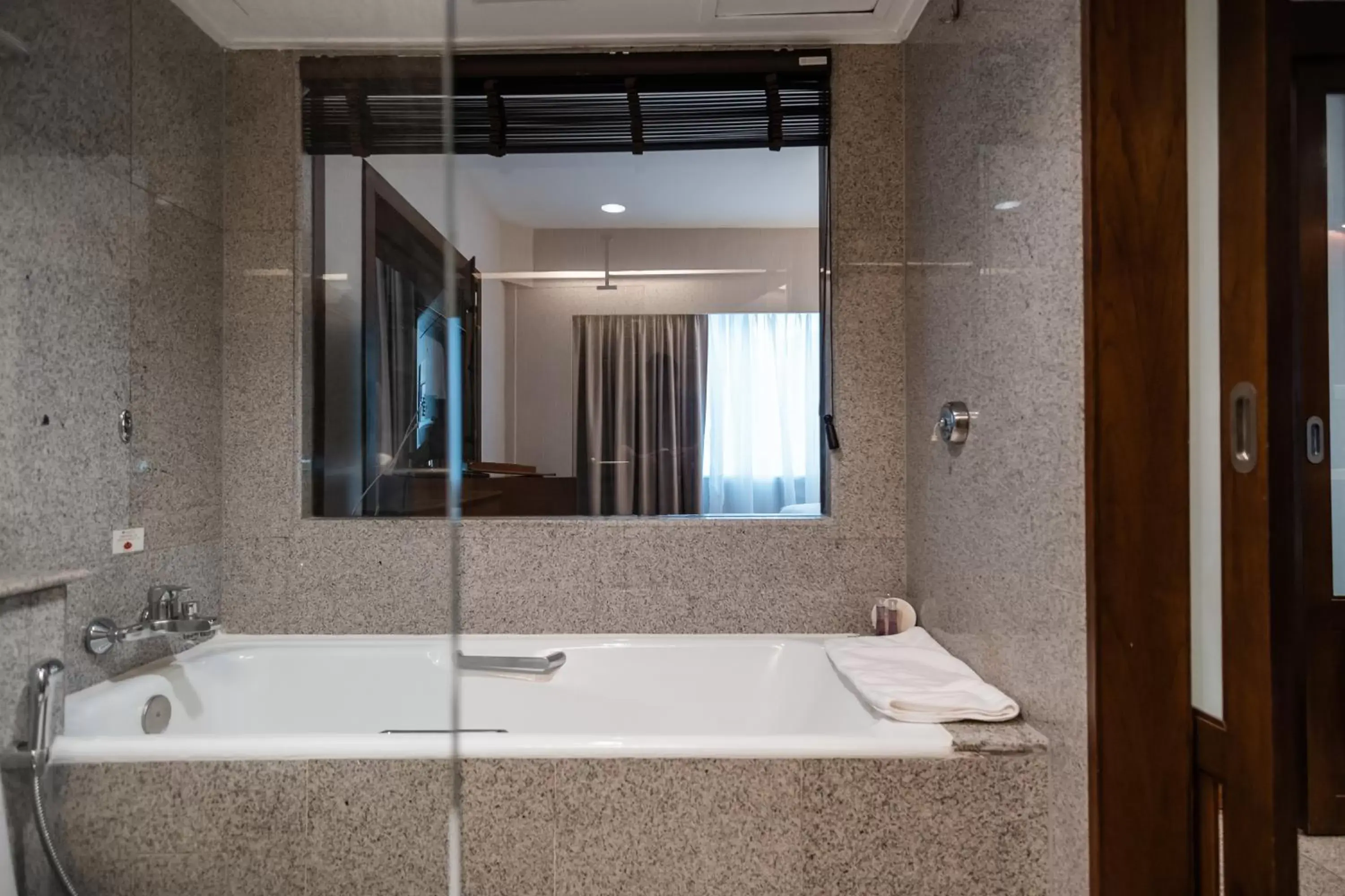 Bathroom in Ramada Plaza by Wyndham Bangkok Menam Riverside