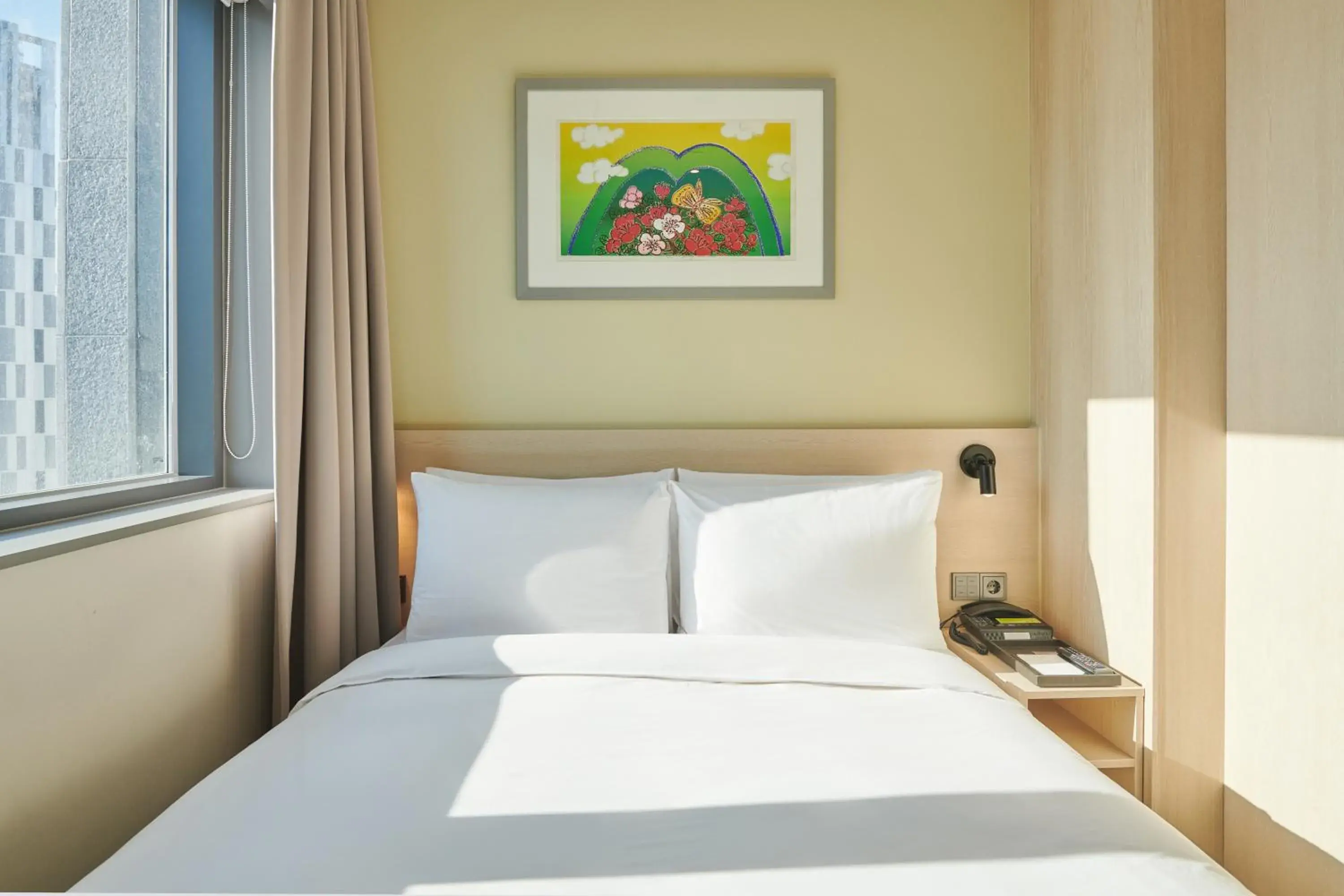 Decorative detail, Bed in Nine Tree Hotel Dongdaemun