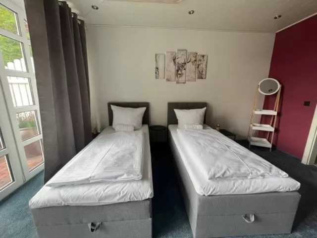 Bed in Hotel Rehkitz