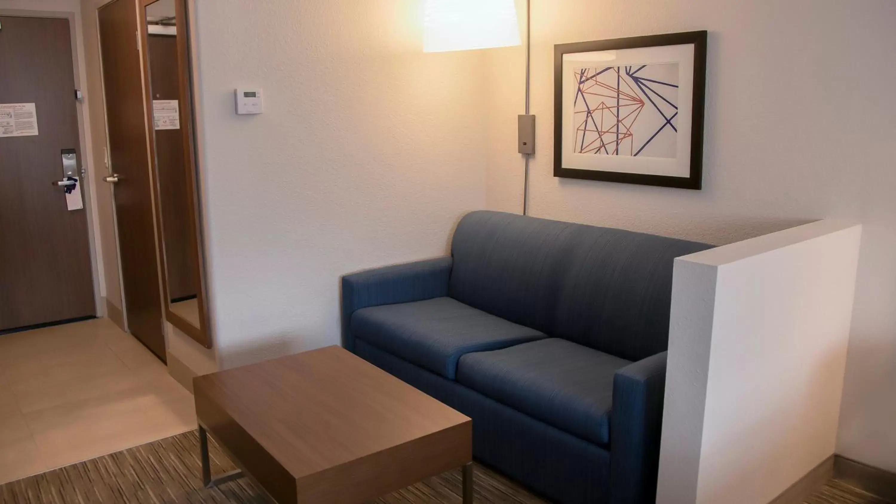 Bedroom, Seating Area in Holiday Inn Express & Suites Colorado Springs North, an IHG Hotel