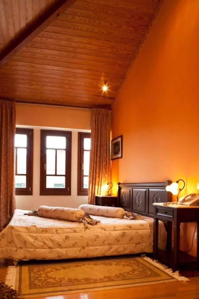 Bed in Hotel Kynaitha