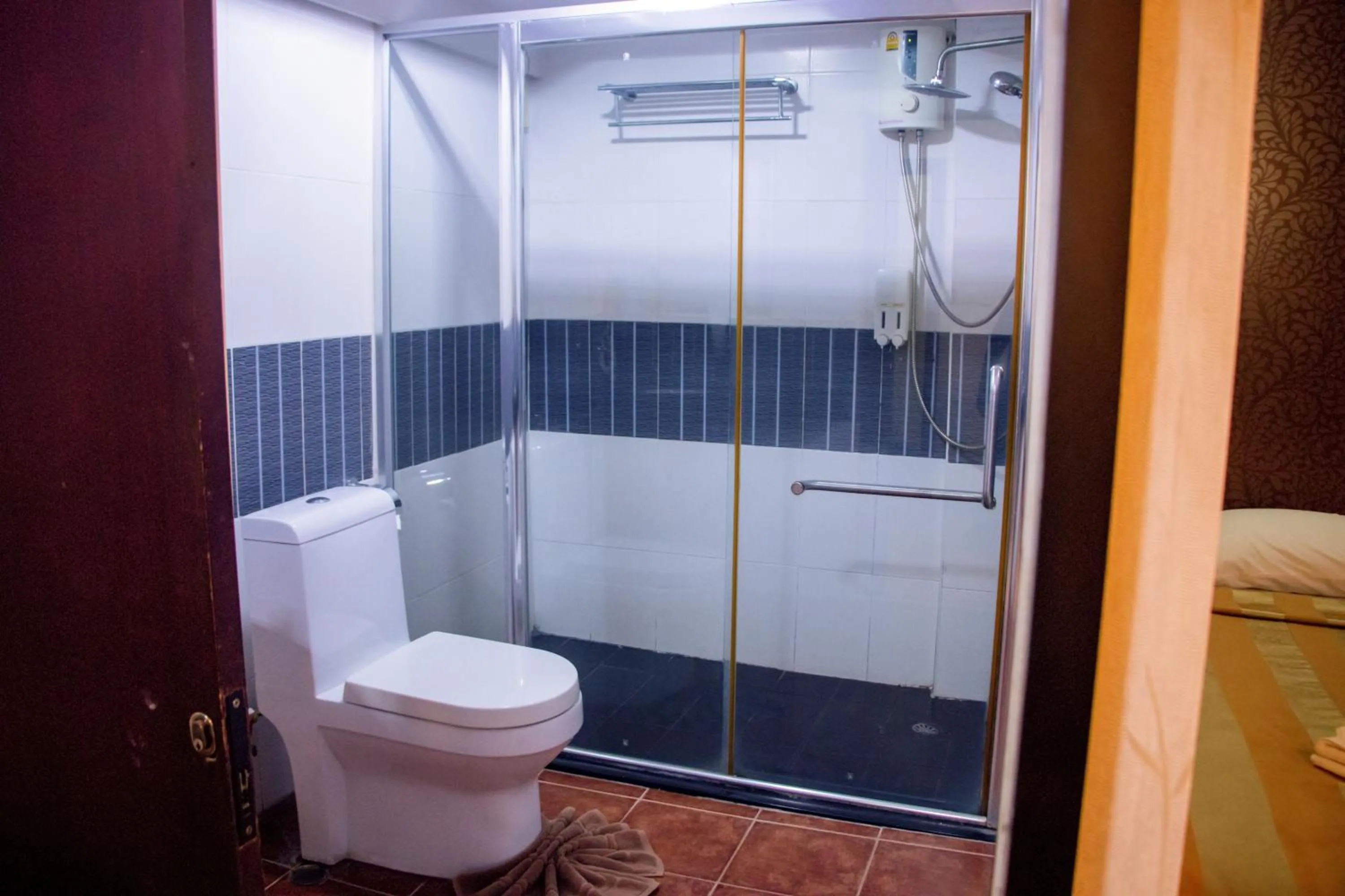 Shower in Visiting Card Hotel & Resort