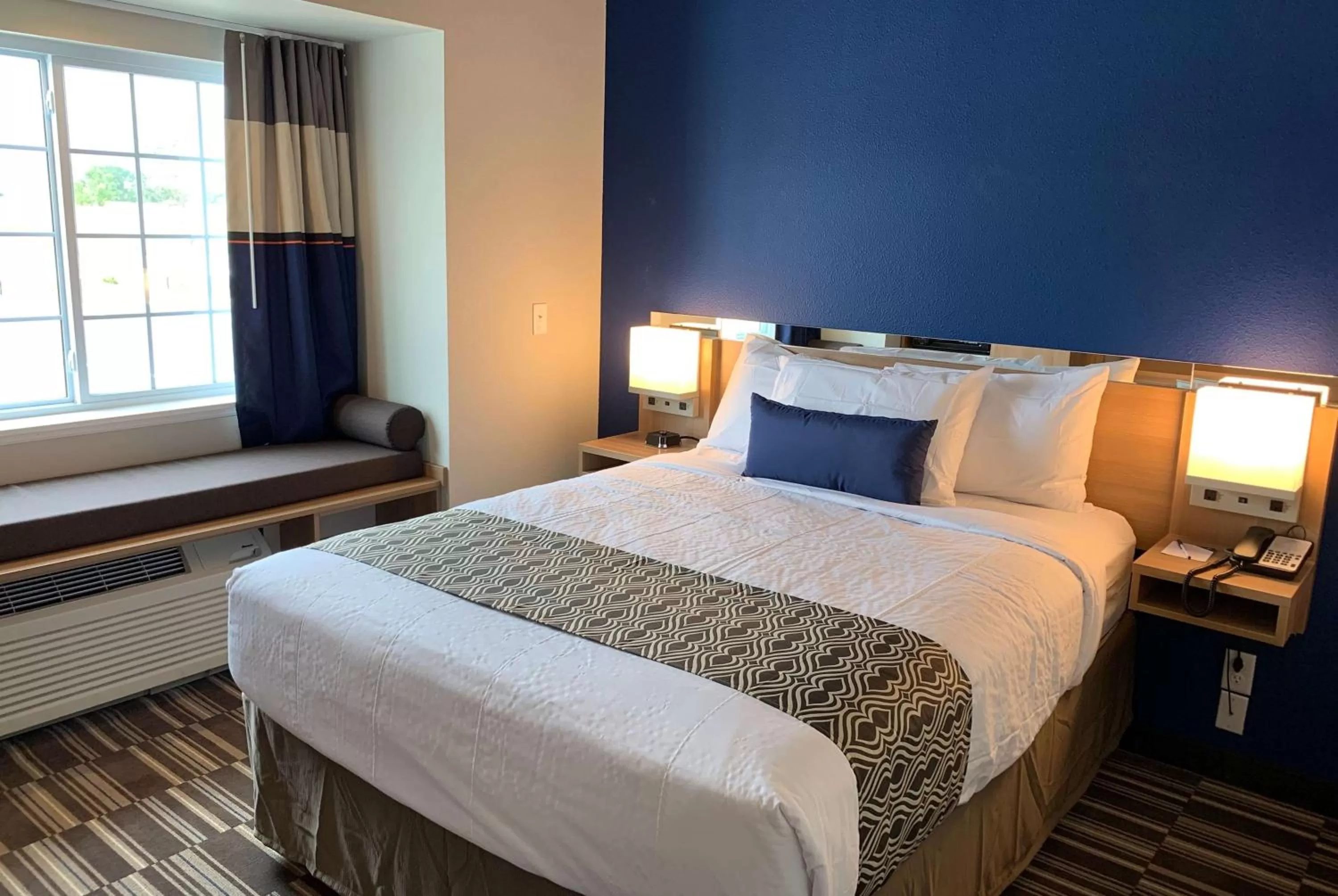 Photo of the whole room, Bed in Microtel Inn & Suites by Wyndham Fountain Fort Carson